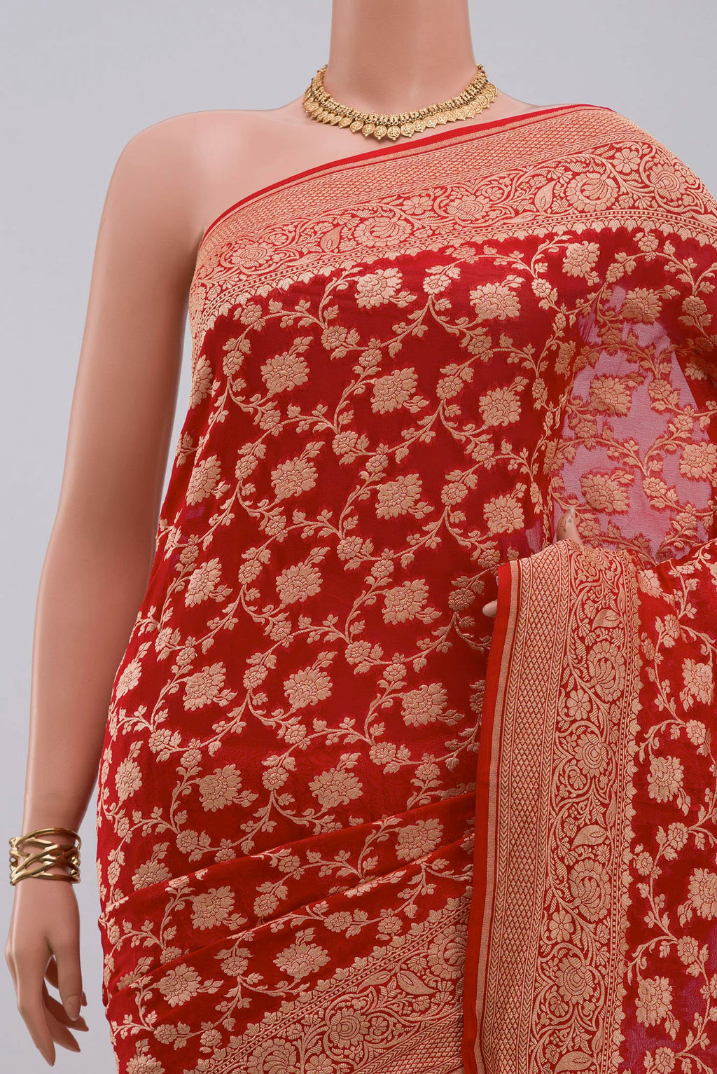 Border image of Red Georgette Saree with Fancy on the body and Fancy Border. 