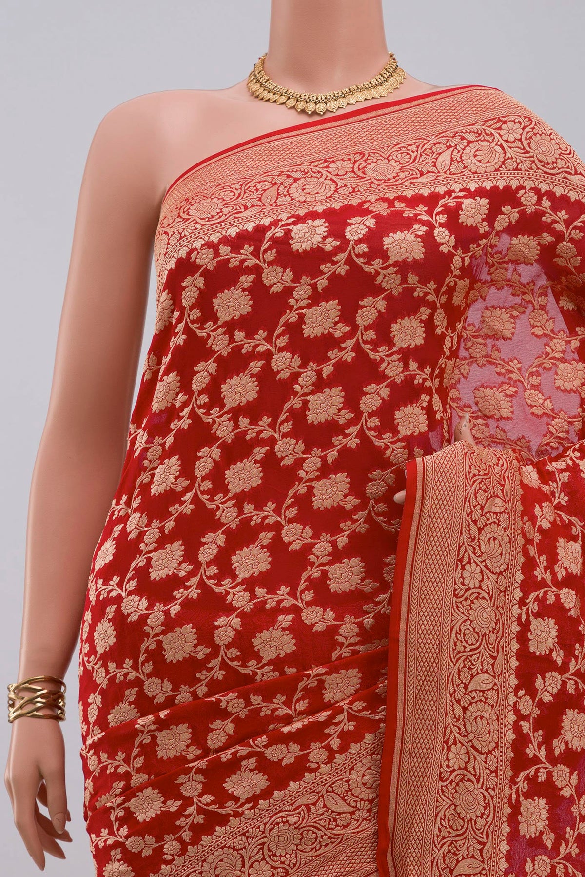 Border image of Red Georgette Saree with Fancy on the body and Fancy Border. 