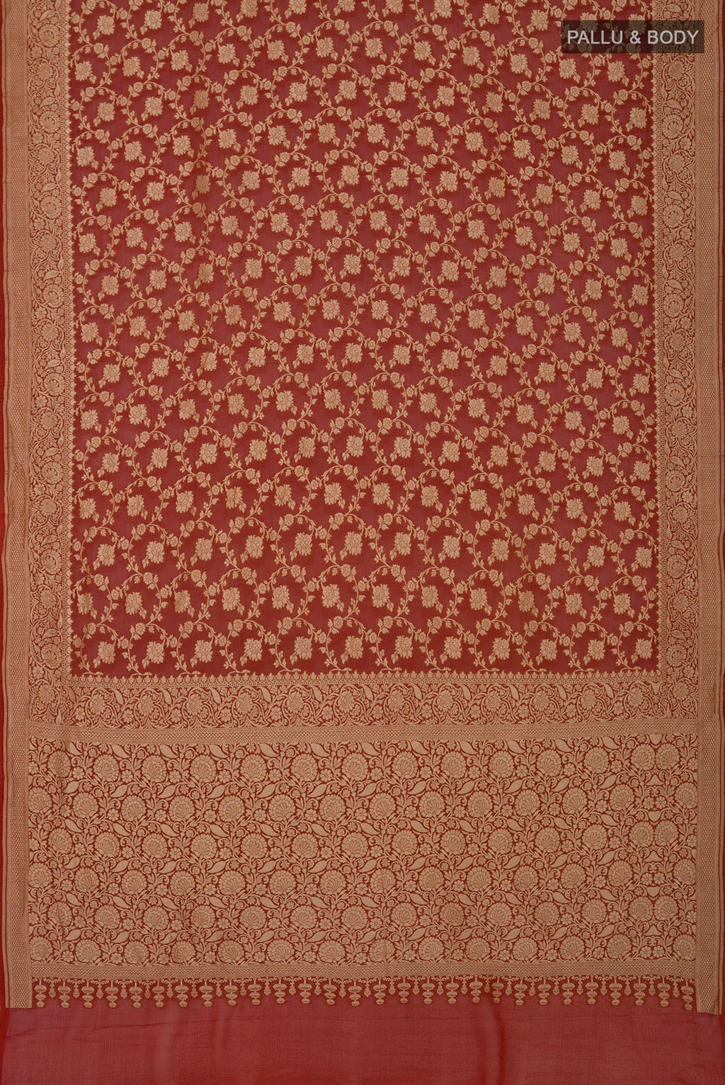 Flat view of Rust Georgette Saree with Fancy on the body and Fancy Border. 