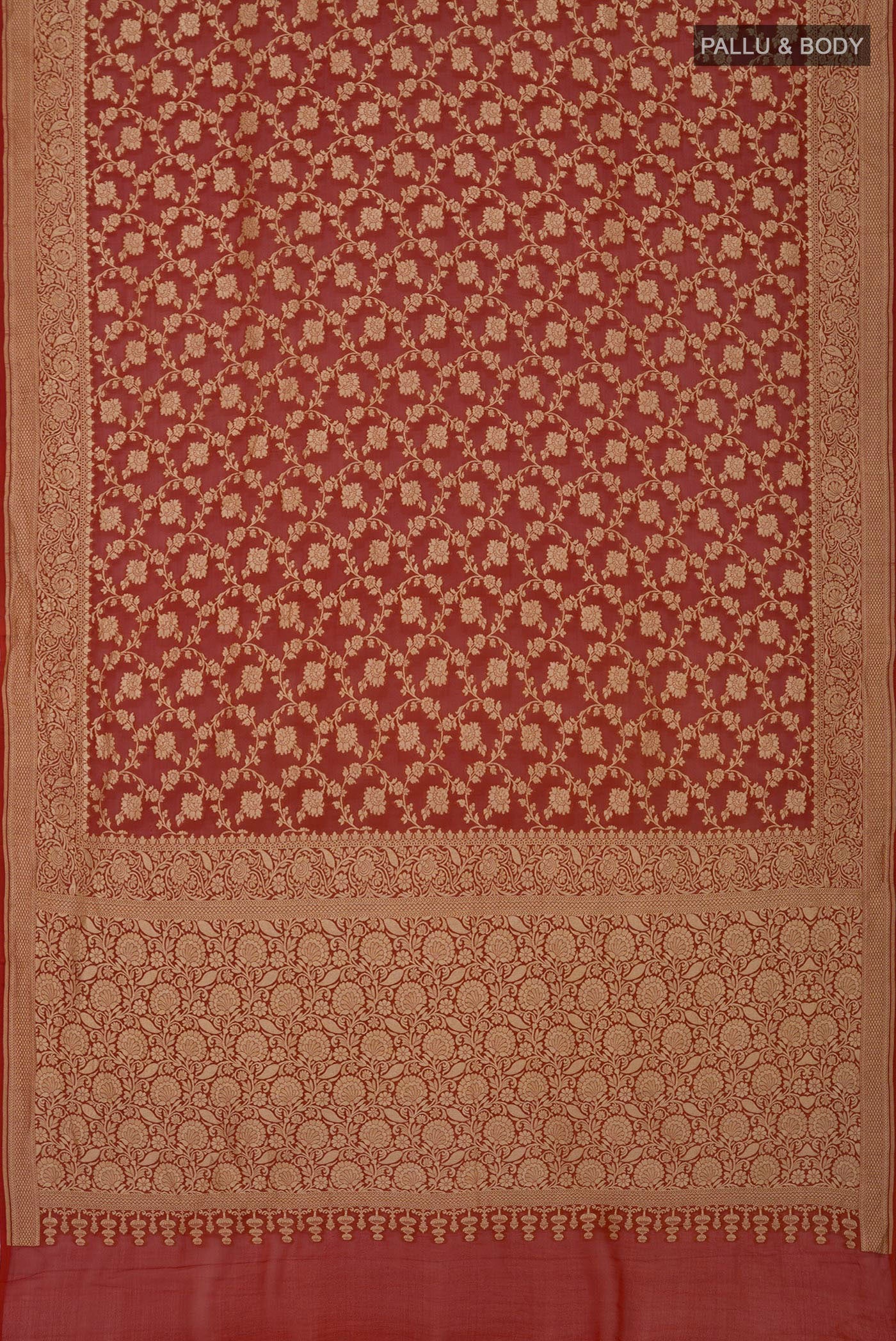 Flat view of Rust Georgette Saree with Fancy on the body and Fancy Border. 