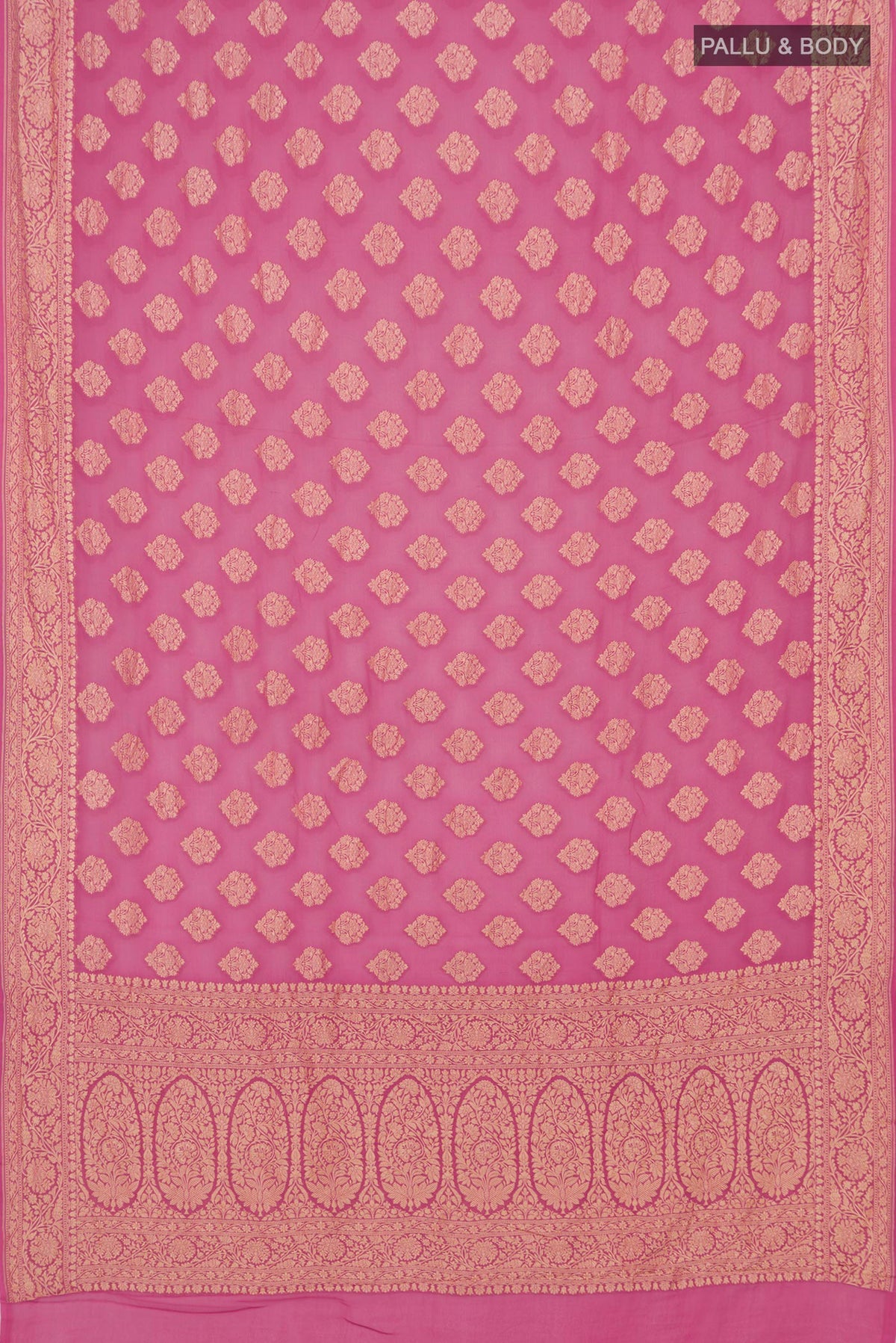 Flat view of Pink Georgette Saree with Zari Butta on the body and Zari Border. 