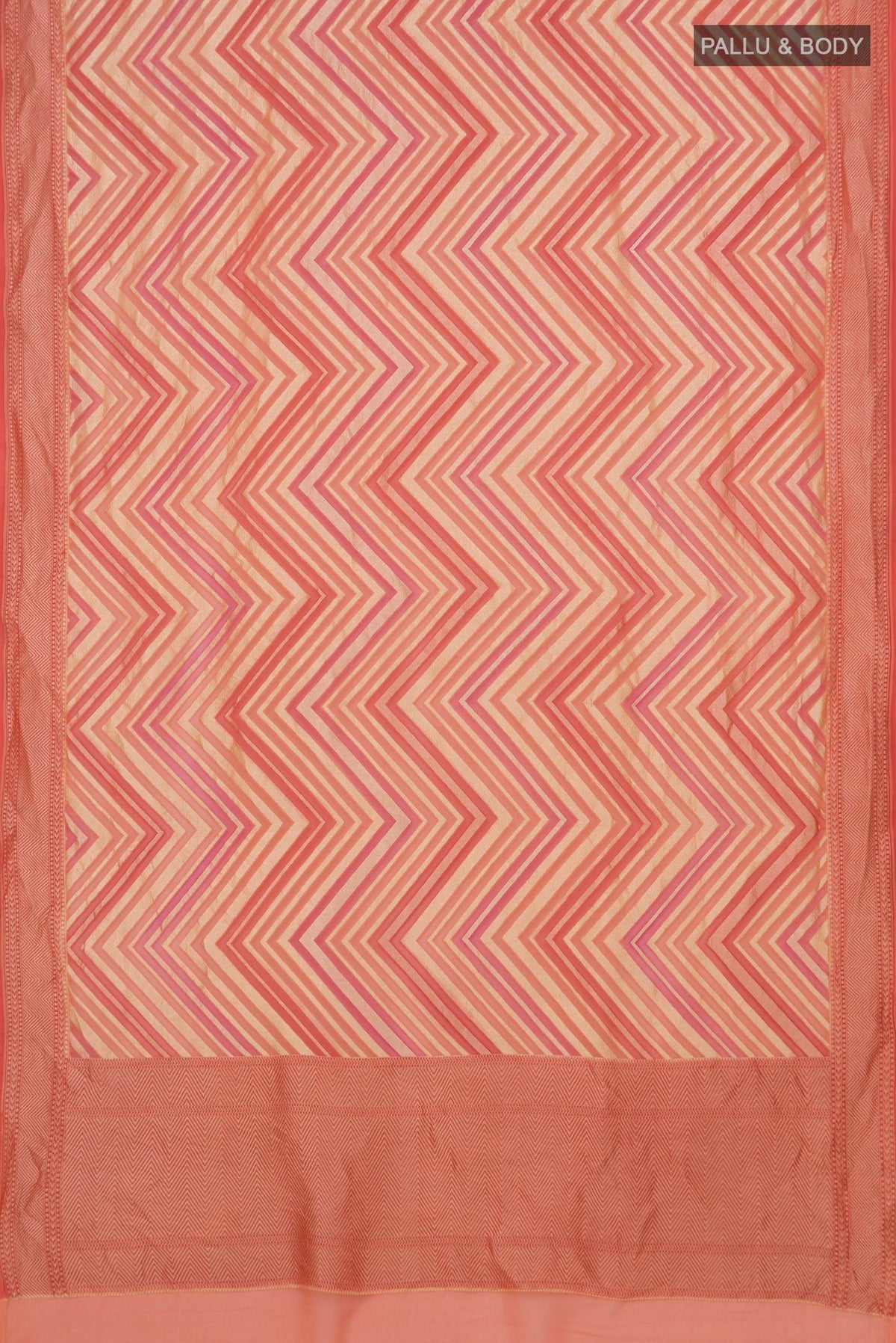 Flat view of Peach Banarasi Georgette Saree with Zig Zag design on the body and Zari Border. 