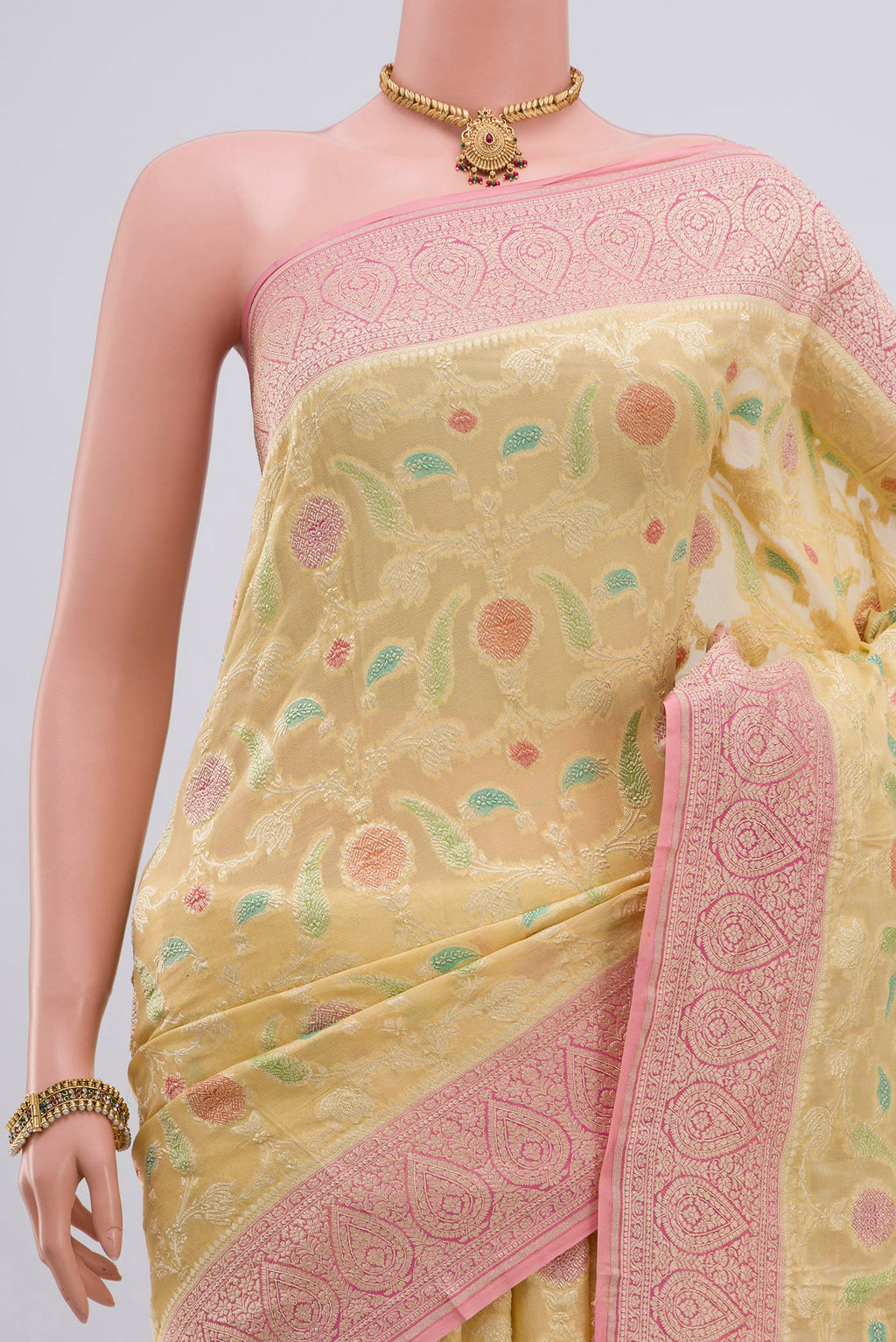 Border image of Yellow Georgette Saree with Fancy on the body and Zari Border. 