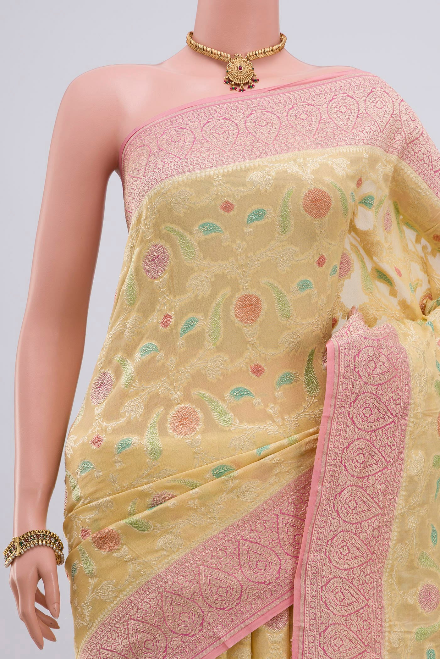 Border image of Yellow Georgette Saree with Fancy on the body and Zari Border. 