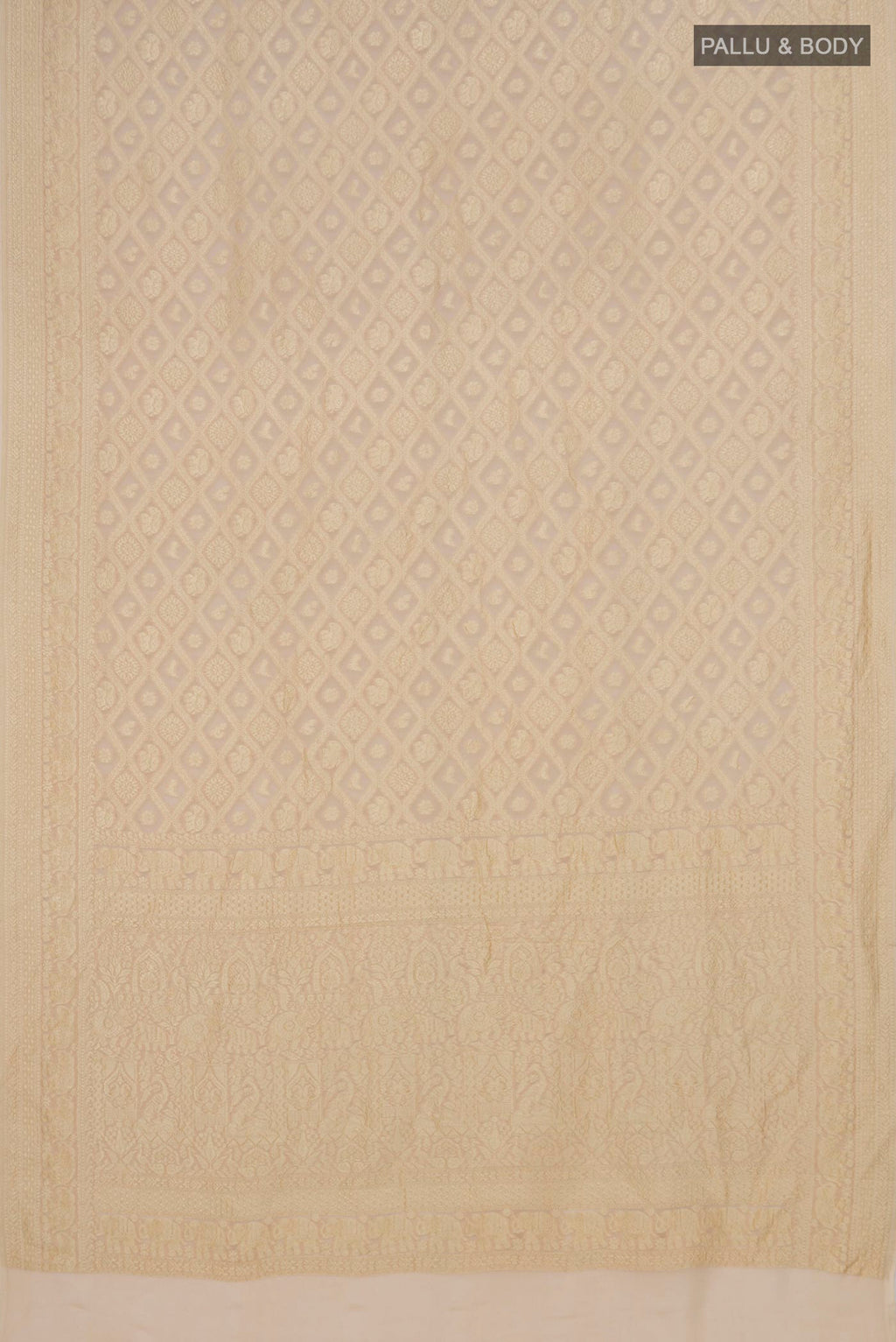 Flat view of Cream Banarasi Georgette Saree with Zari Brocade on the body and Zari Border. 