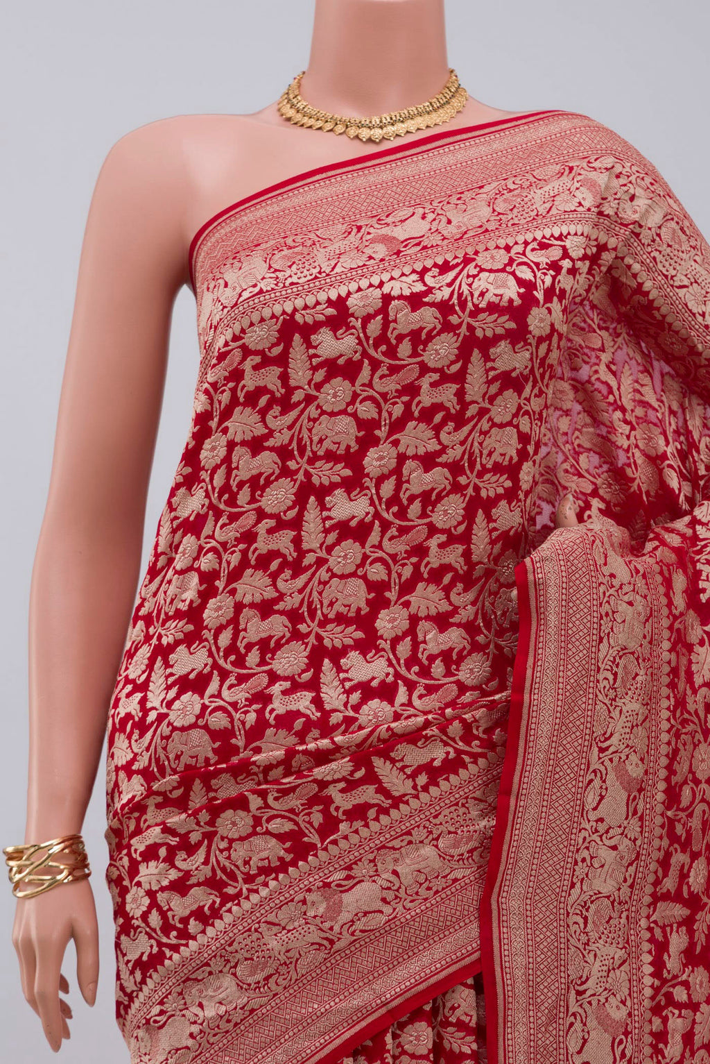 Border image of Red Banarasi Georgette Saree with Fancy on the body and Zari Border. 