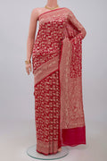 Red Banarasi Georgette Saree with Fancy on the body and Zari Border.  displayed on a mannequin