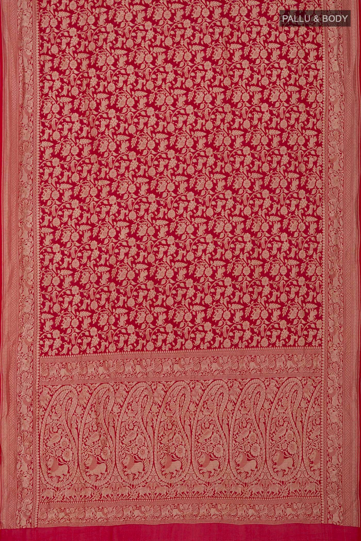 Flat view of Red Banarasi Georgette Saree with Fancy on the body and Zari Border. 