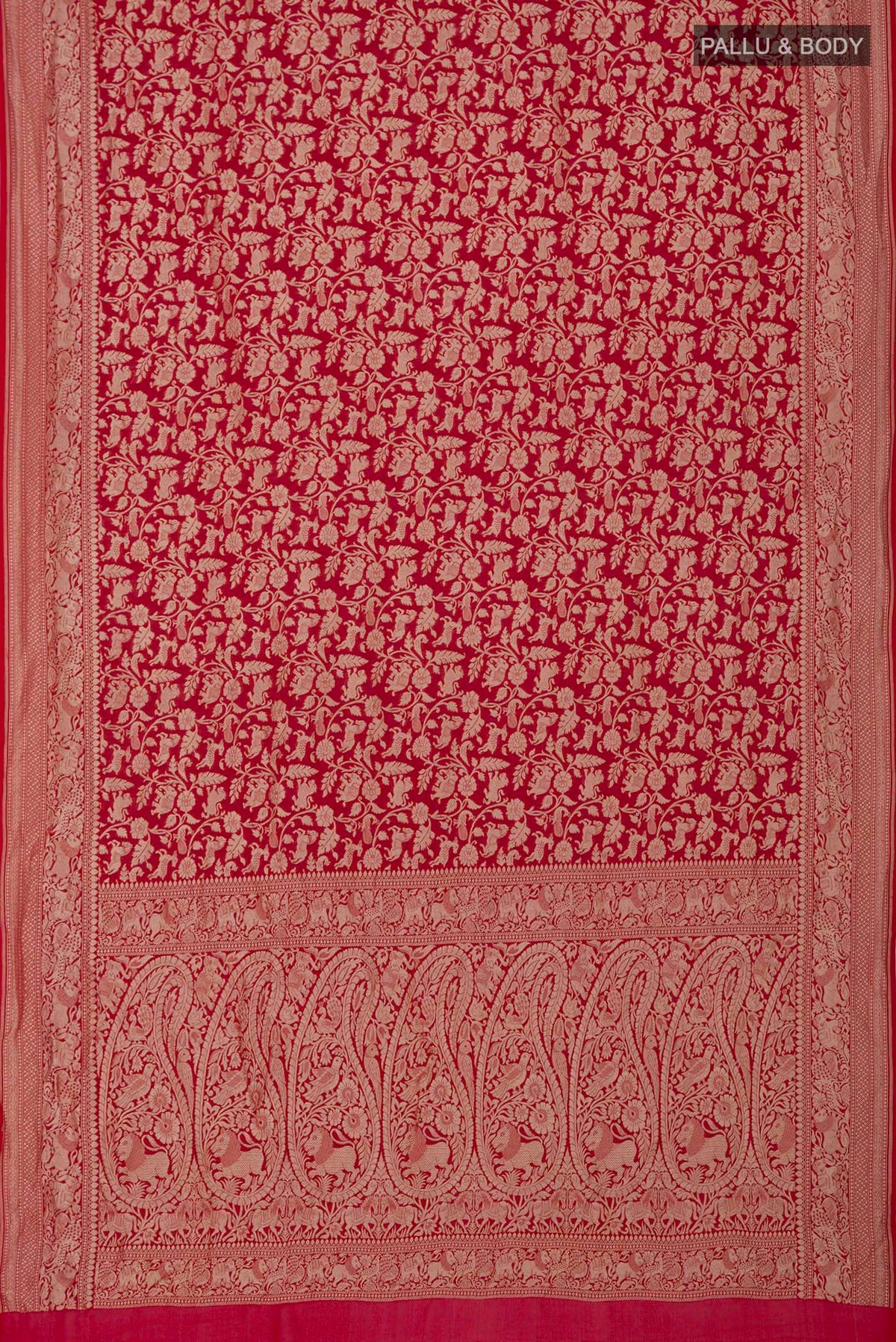 Flat view of Red Banarasi Georgette Saree with Fancy on the body and Zari Border. 