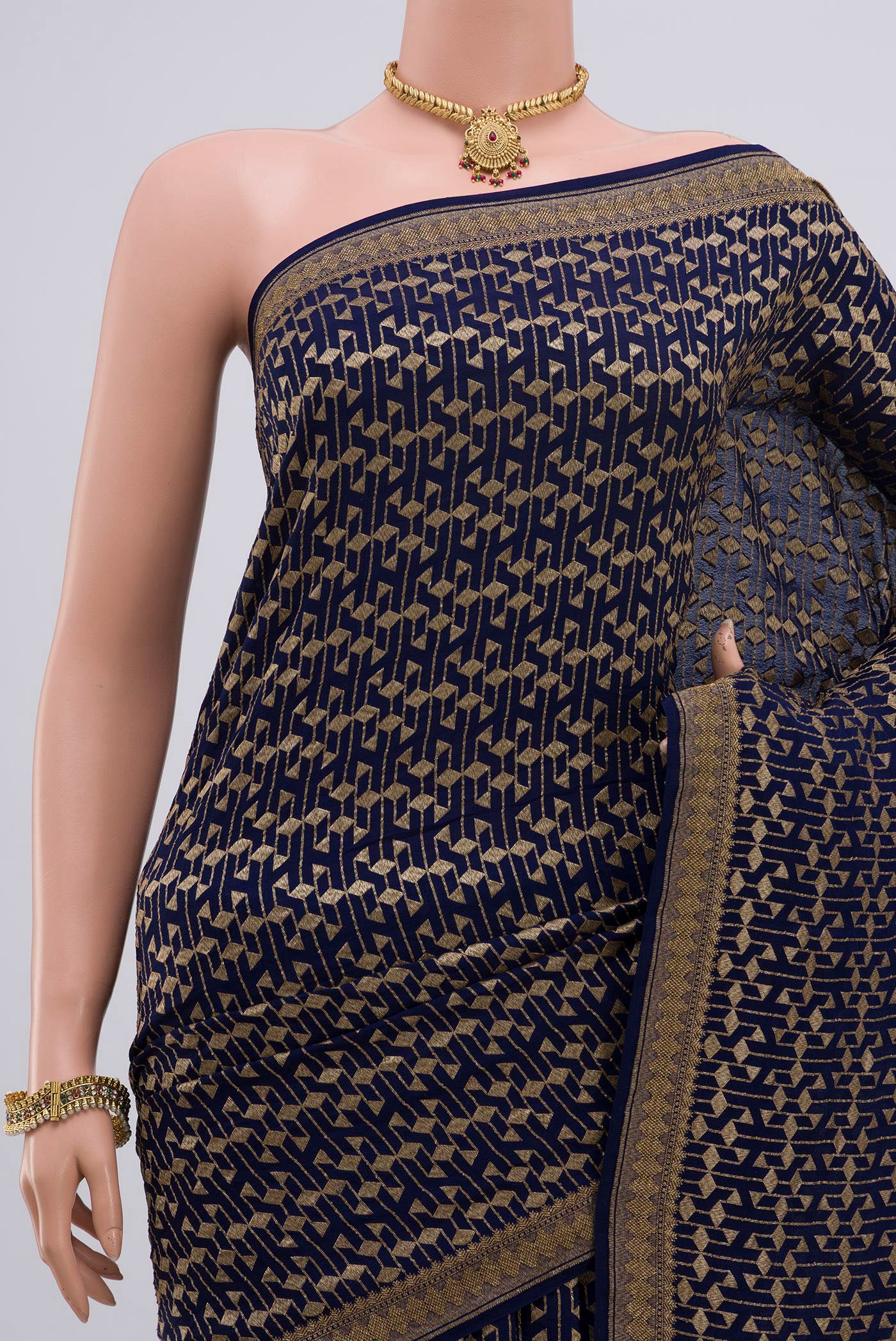 Border image of Blue Georgette Saree with Fancy on the body and Zari Border. 