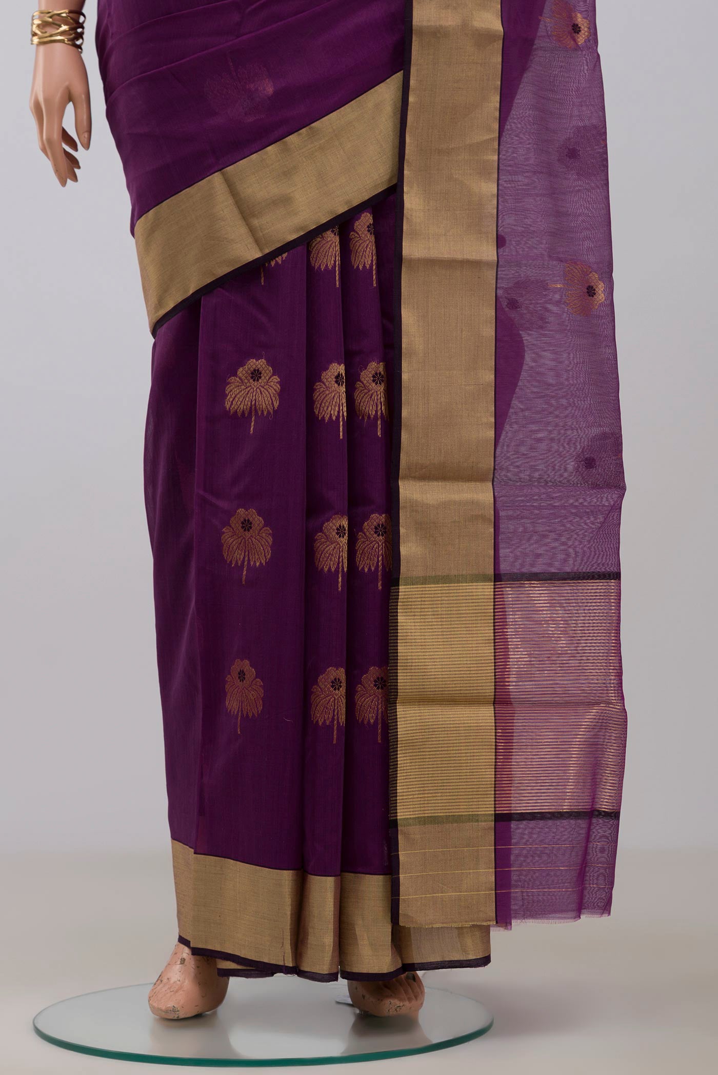 Pleats and pallu of Purple Chanderi Silk Cotton Saree with Zari Butta on the body and Zari Border. 
