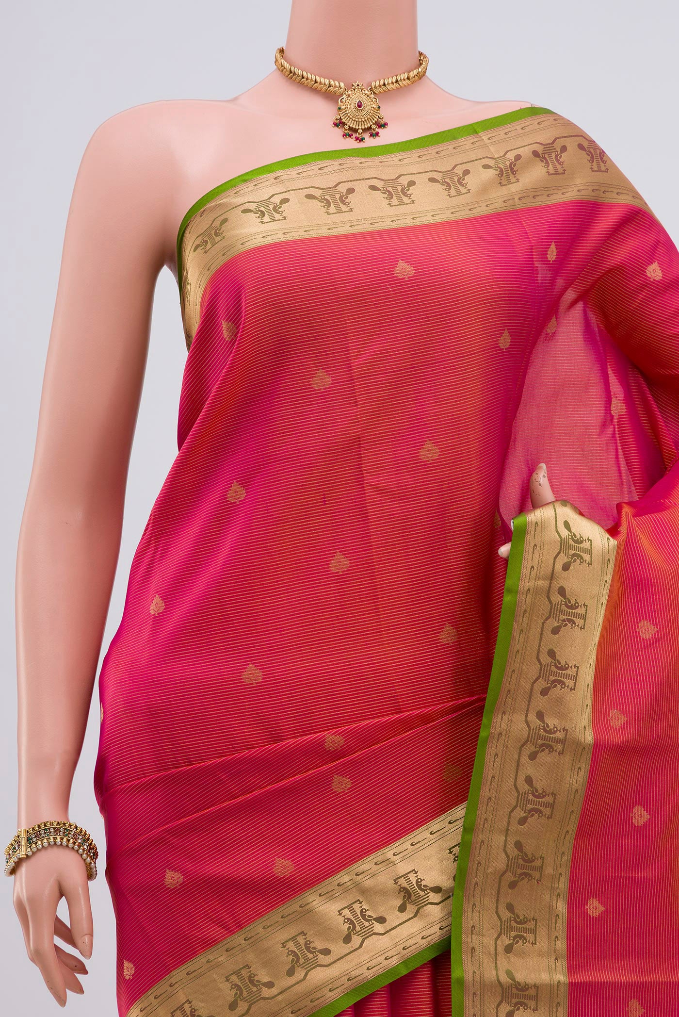 Border image of Pink Kanchipuram Silk Saree with Zari Butta on the body and Zari Border. 