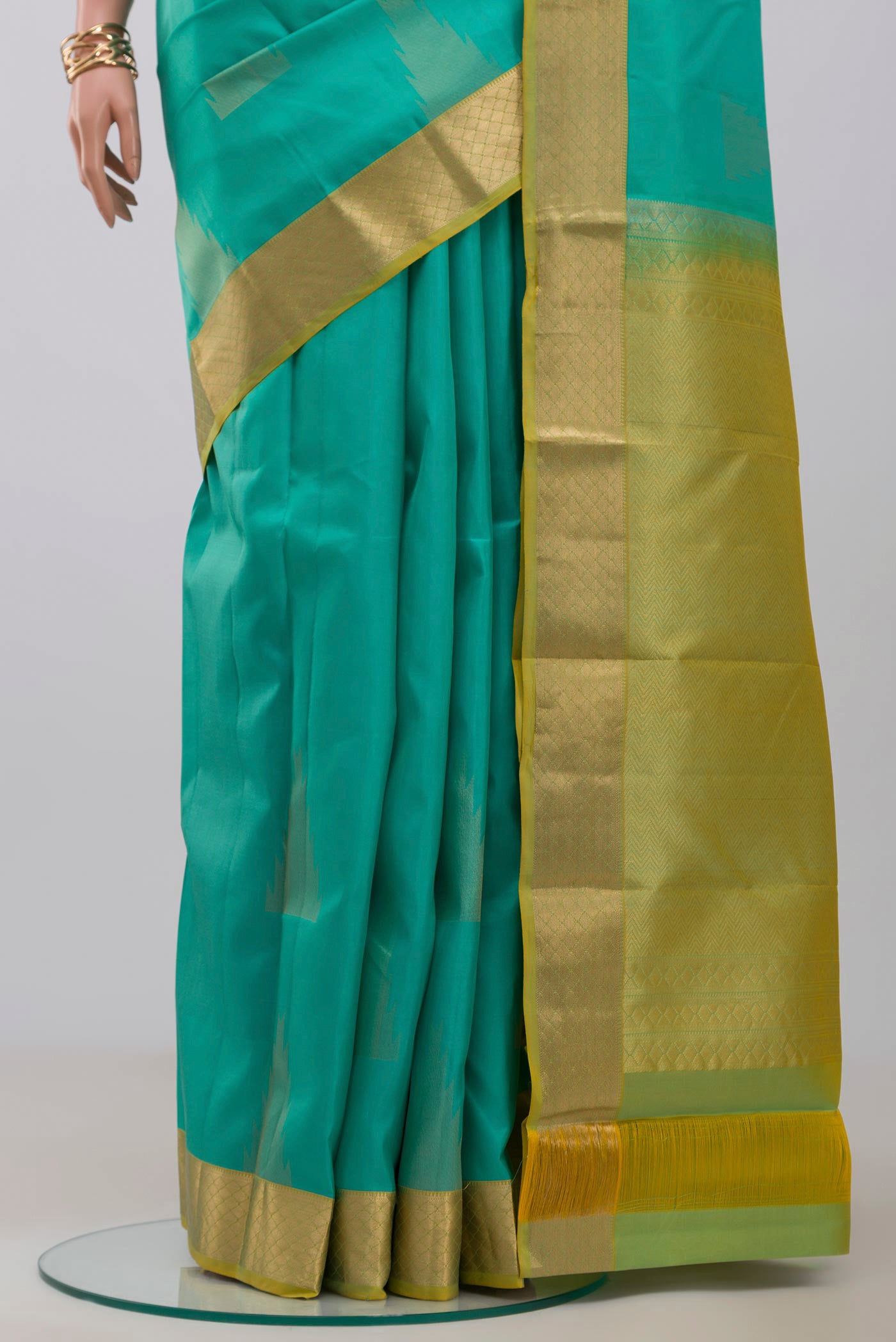 Pleats and pallu of Blue Kanchipuram Silk Saree with Zari Butta on the body and Zari Border. 