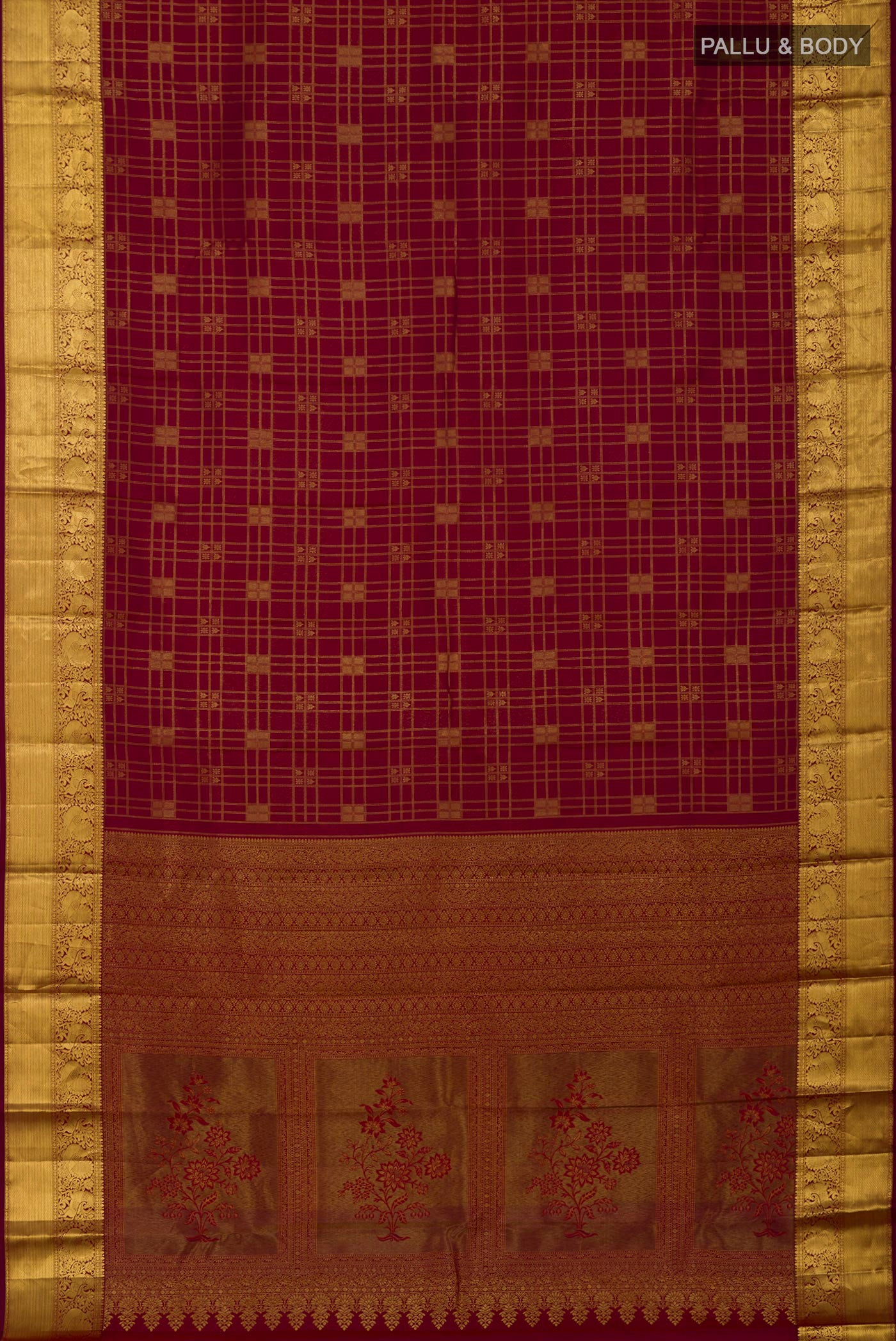 Flat view of Maroon Kanchipuram Saree with Zari Brocade on the body and Zari Border. 