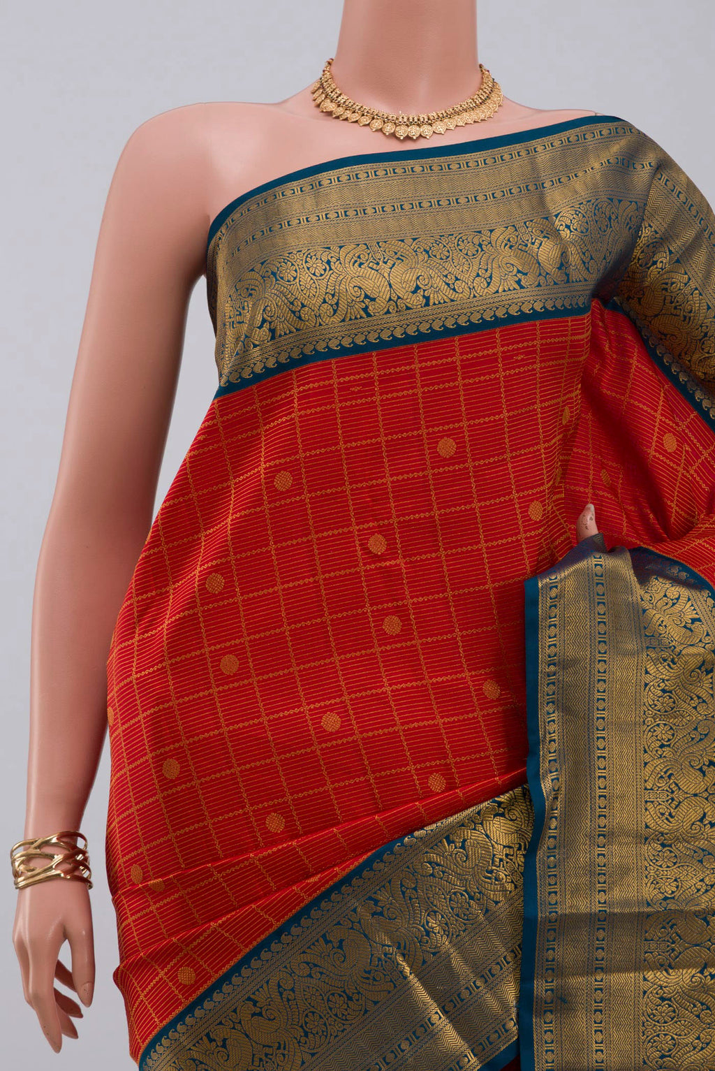 Border image of Red Kanjivaram Saree with Zari Brocade on the body and Zari Border. 