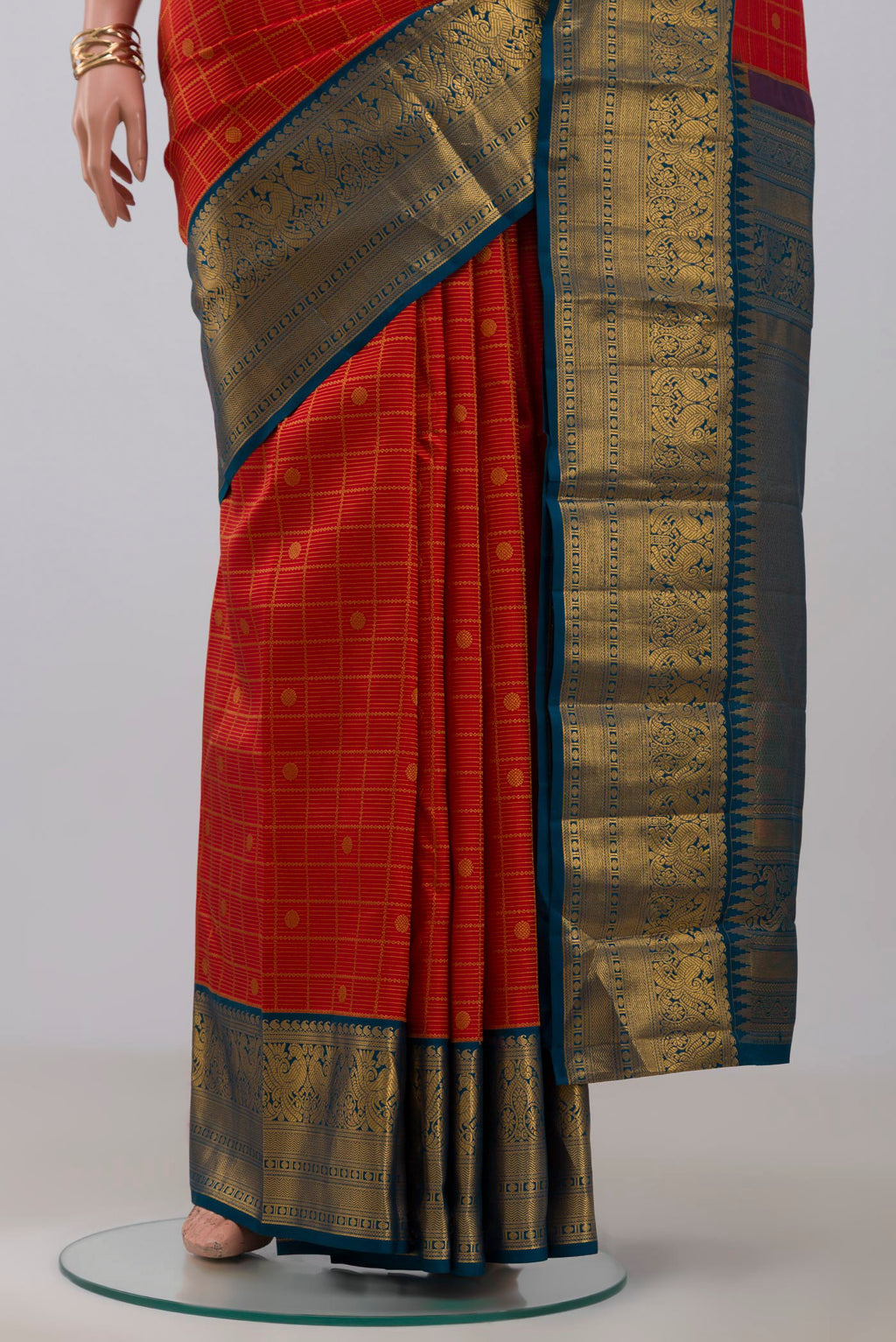 Pleats and pallu of Red Kanjivaram Saree with Zari Brocade on the body and Zari Border. 