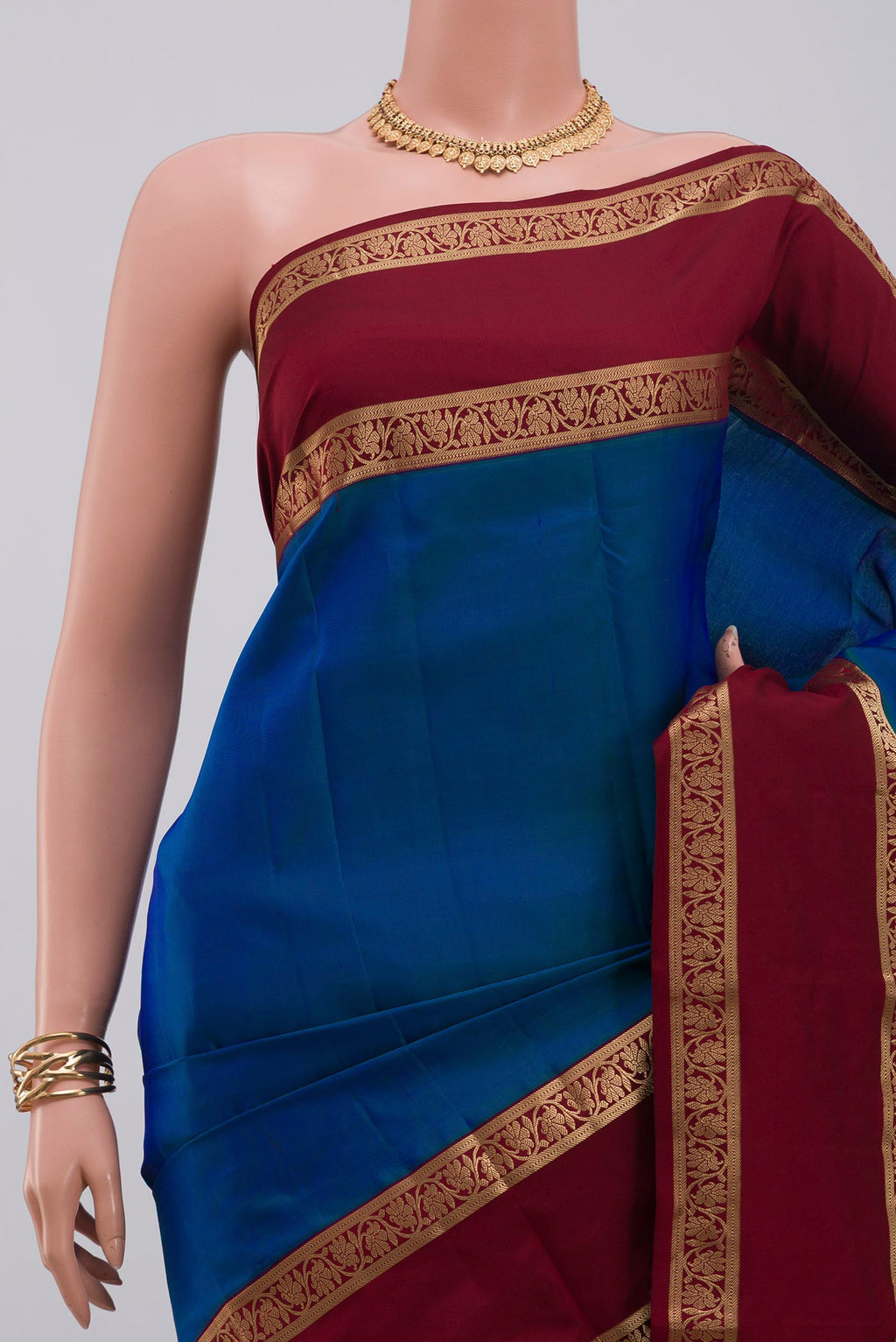 Border image of Blue Kanchipuram Saree with Plain Body and Zari Border. 