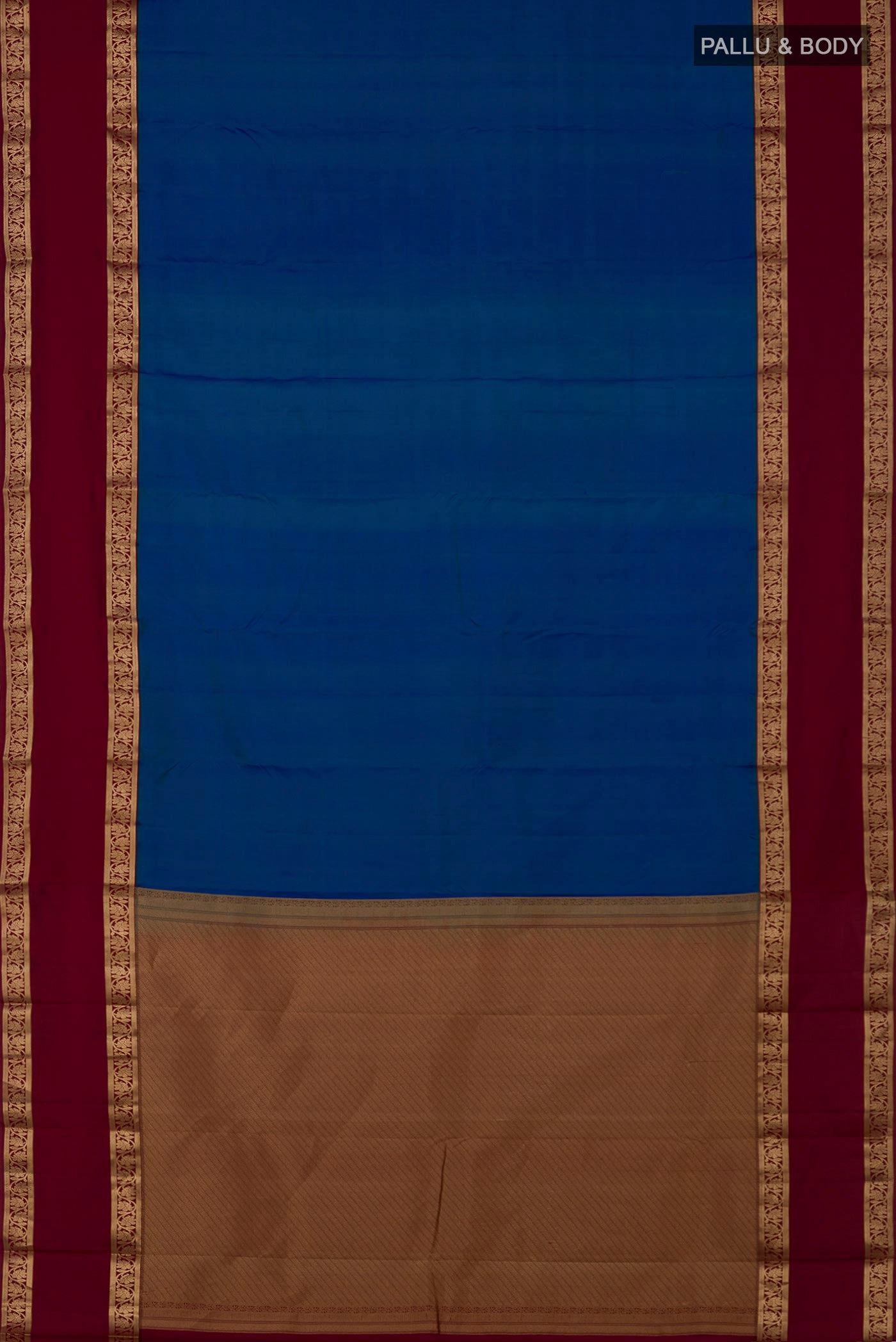 Flat view of Blue Kanchipuram Saree with Plain Body and Zari Border. 