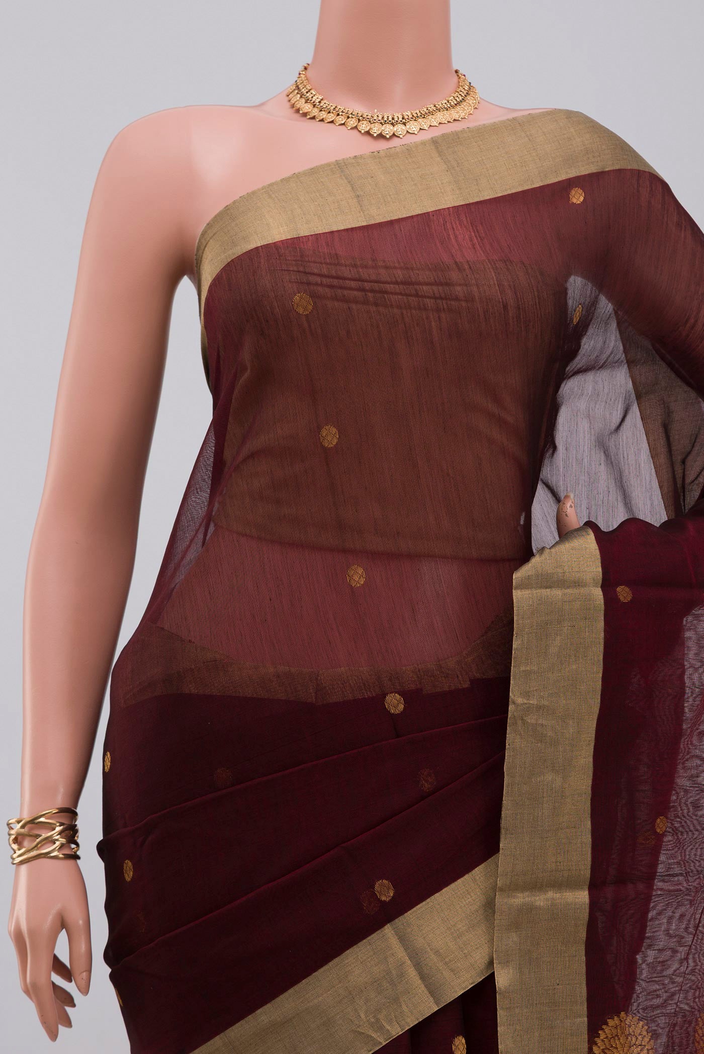 Border image of Maroon Chanderi Silk Cotton Saree with Zari Butta on the body and Zari Border. 