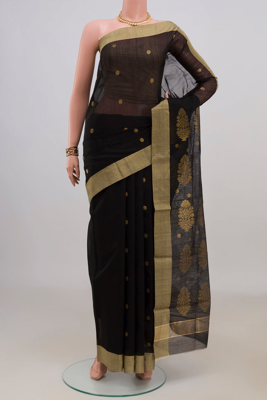 Black Chanderi Cotton Saree with Zari Butta on the body and Zari Border.  displayed on a mannequin