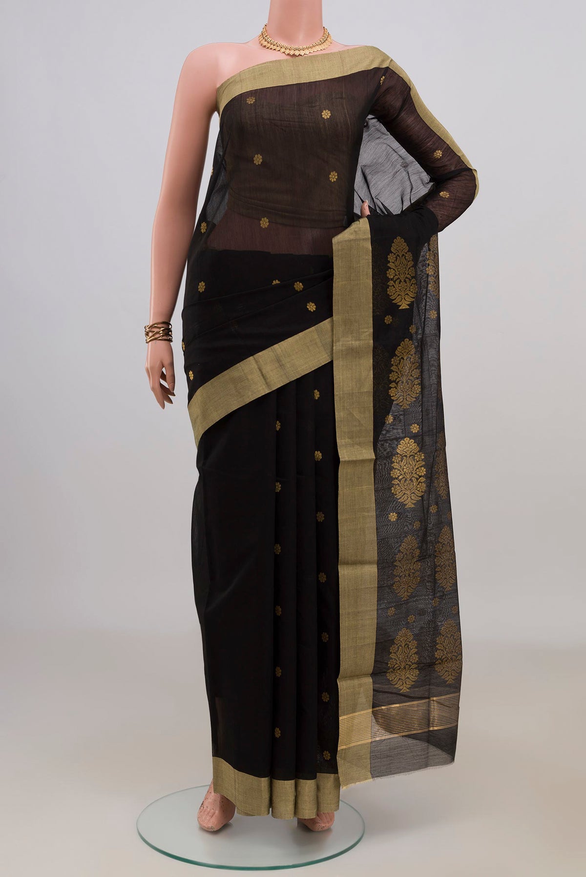 Black Chanderi Cotton Saree with Zari Butta on the body and Zari Border.  displayed on a mannequin
