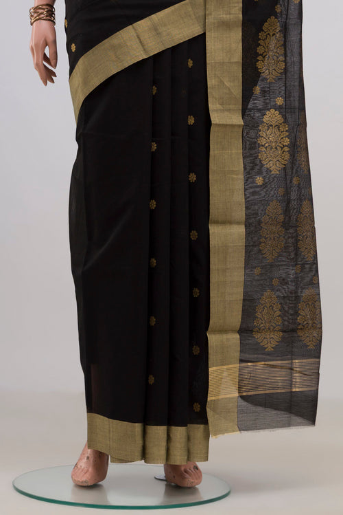 Pleats and pallu of Black Chanderi Cotton Saree with Zari Butta on the body and Zari Border. 