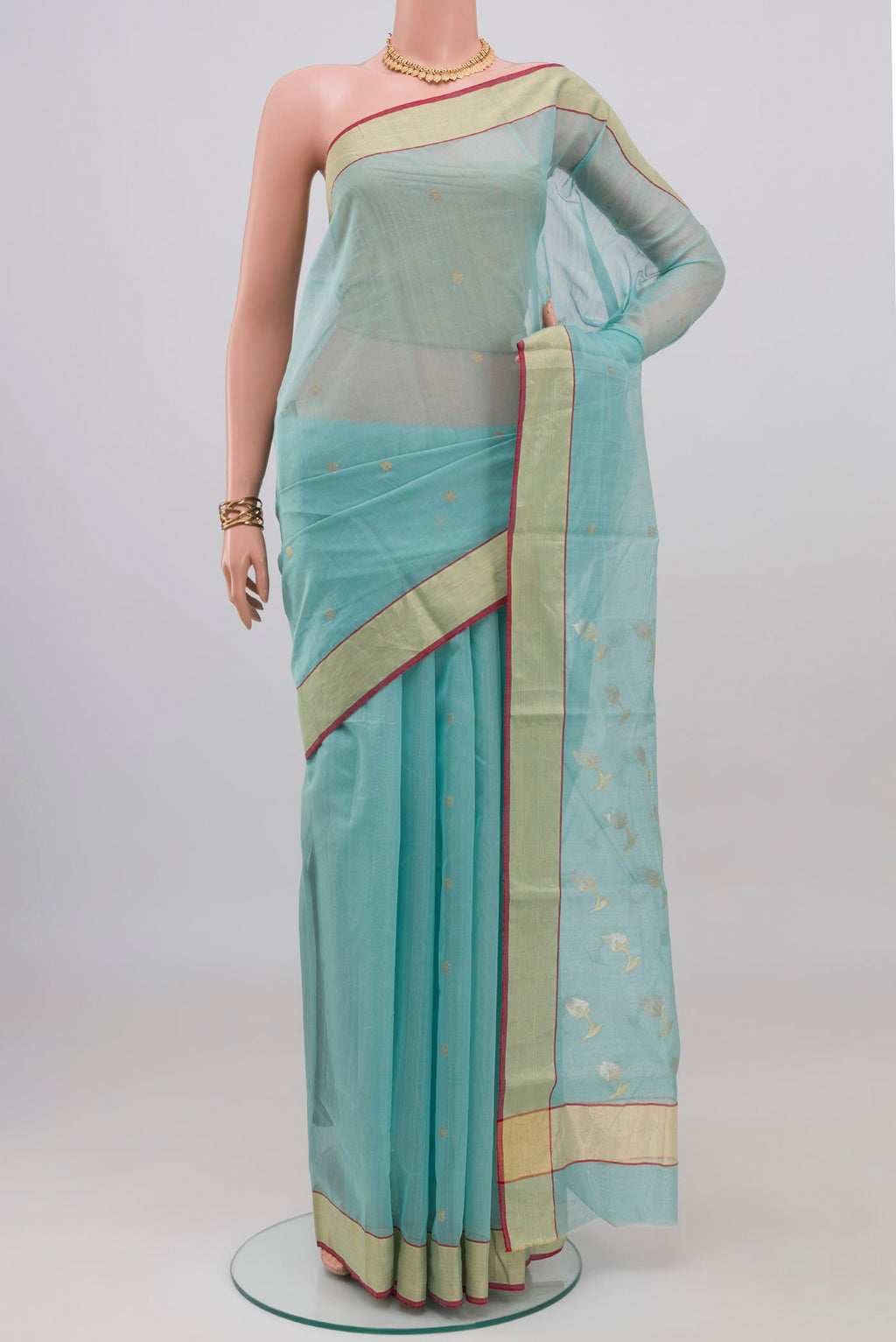 Blue Chanderi Silk Cotton Saree with Zari Butta on the body and Zari Border.  displayed on a mannequin
