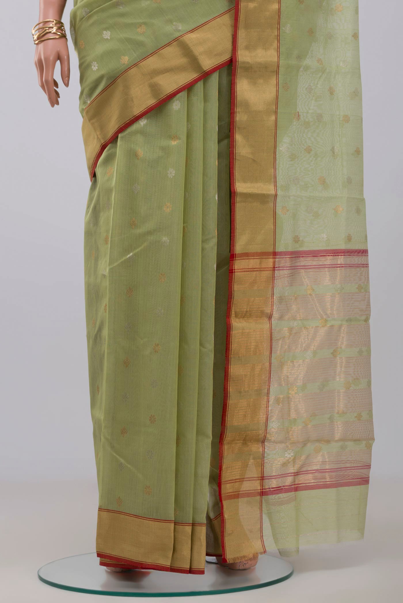 Pleats and pallu of Green Chanderi Silk Cotton Saree with Zari Butta on the body and Zari Border. 