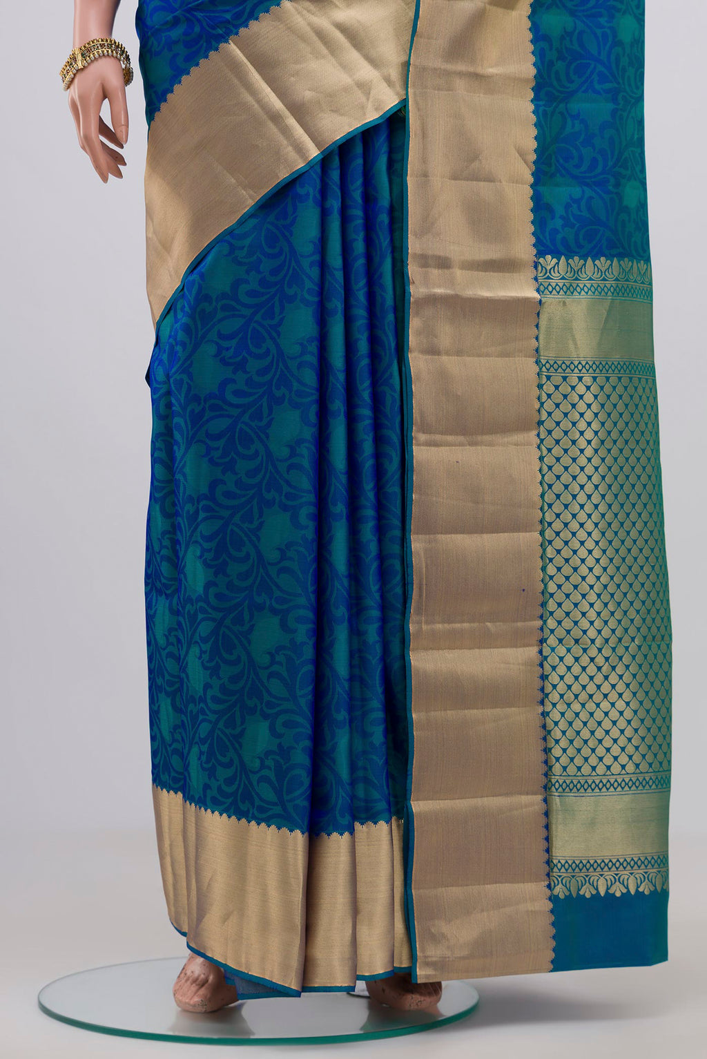 Pleats and pallu of Blue Soft Silk Saree with Jacquard design on the body and Zari Border. 