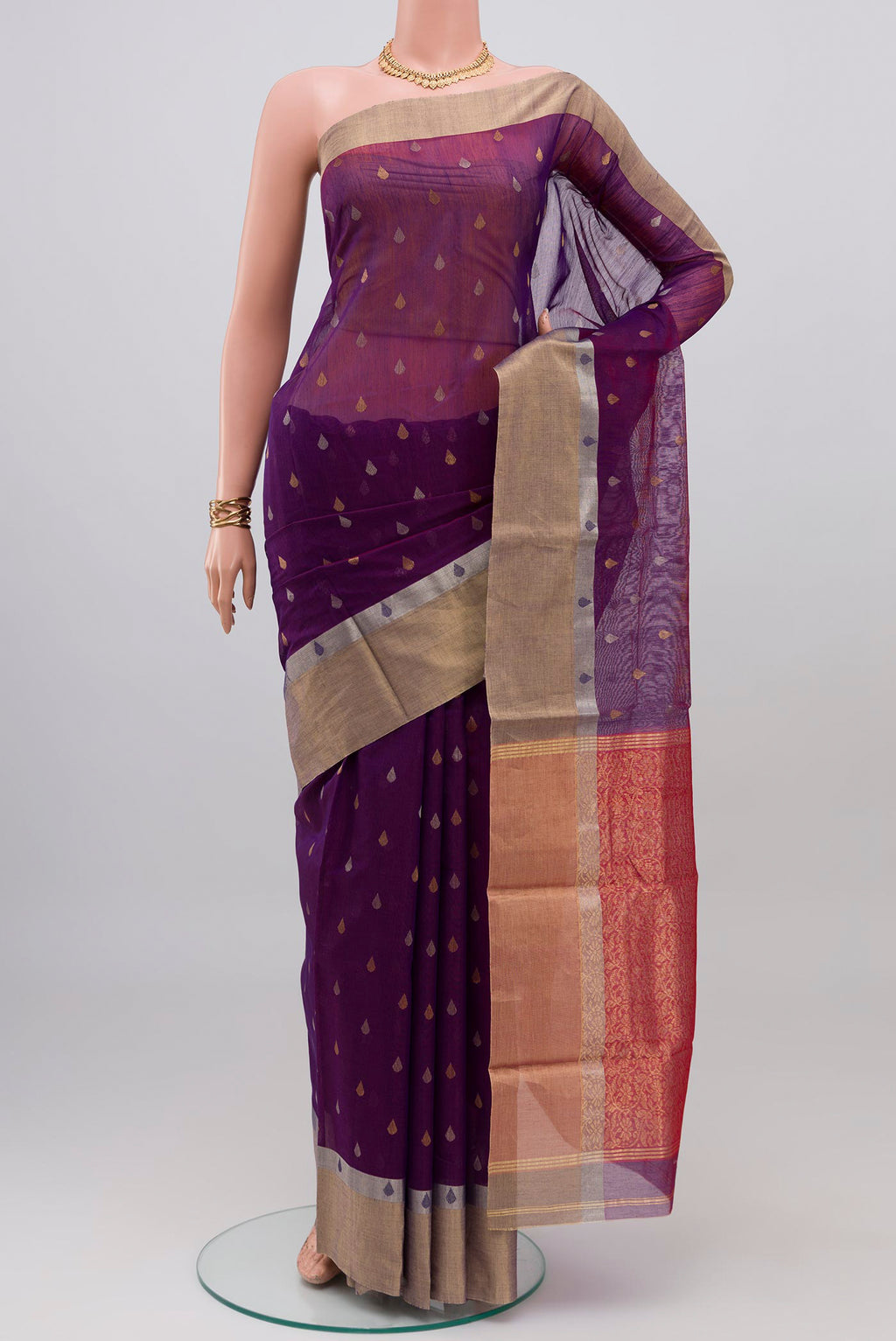 Violet Chanderi Silk Cotton Saree with Zari Butta on the body and Zari Border.  displayed on a mannequin
