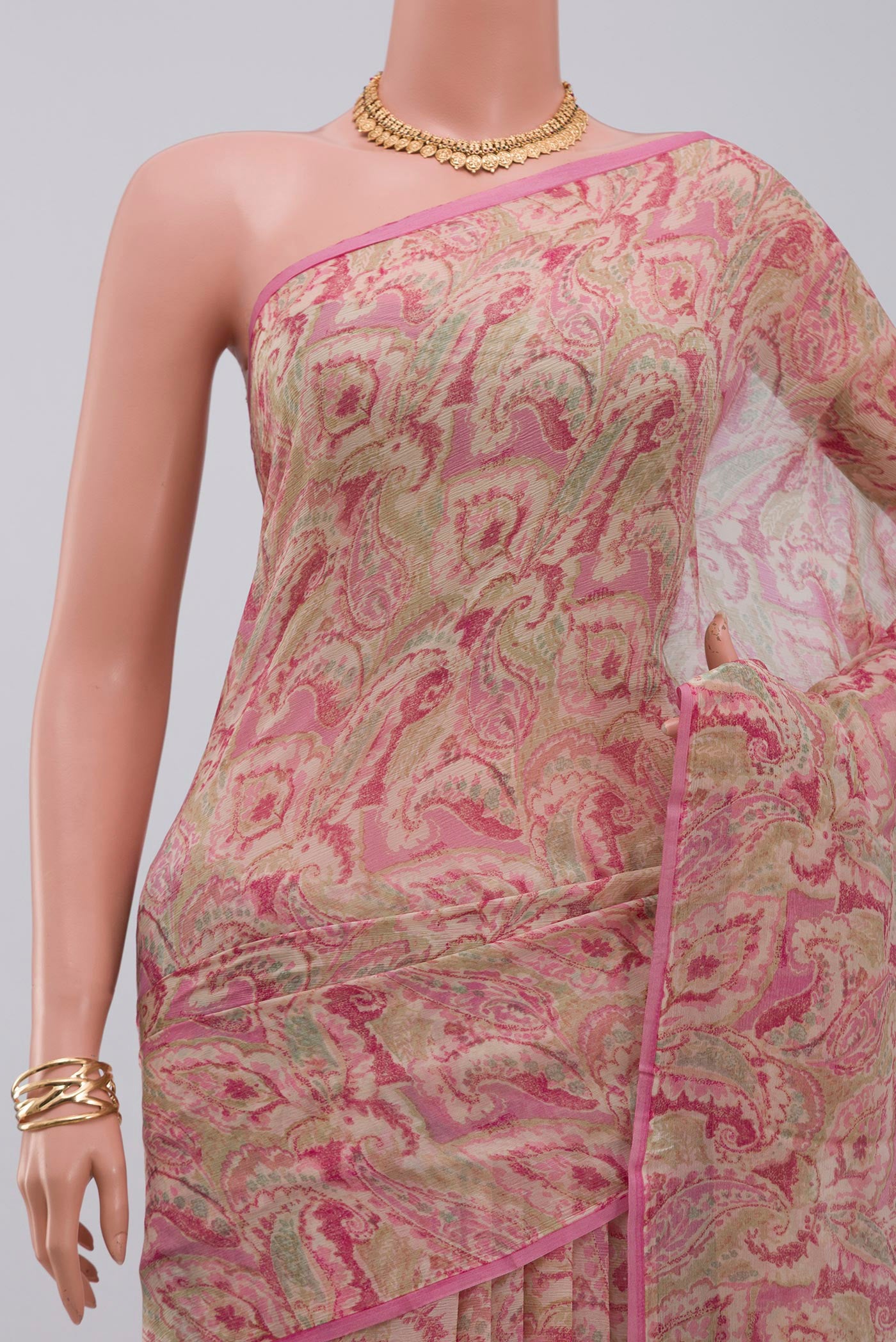Border image of Cream Chiffon Saree with Printed design on the body and Without Border. 