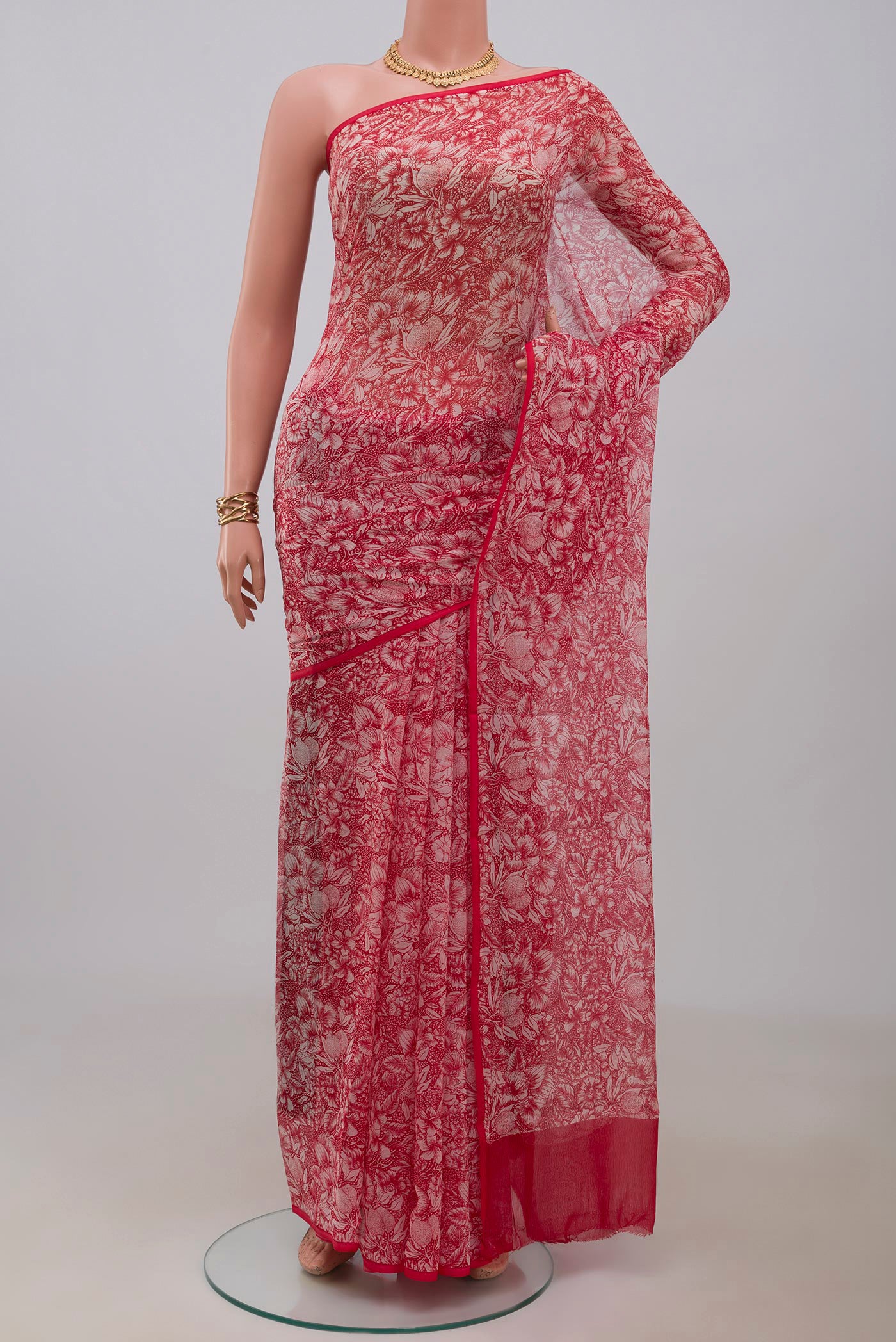 White Mysore Chiffon Saree with Floral Print on the body and Without Border.  displayed on a mannequin