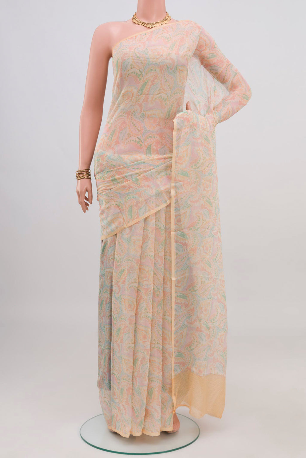 Cream Mysore Chiffon Saree with Printed design on the body and Without Border.  displayed on a mannequin