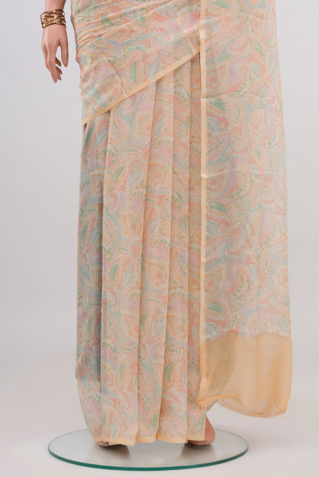 Pleats and pallu of Cream Mysore Chiffon Saree with Printed design on the body and Without Border. 