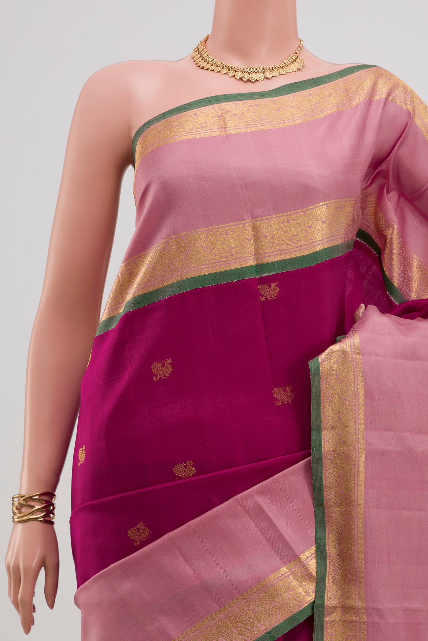 Border image of Pure Silk Pure Zari Pink Kanjivaram Saree with Zari Butta on the body and Zari Border. 