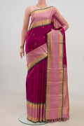 Pure Silk Pure Zari Pink Kanjivaram Saree with Zari Butta on the body and Zari Border.  displayed on a mannequin