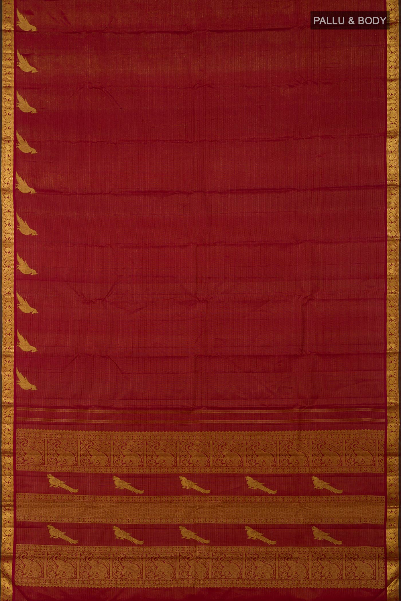 Flat view of Maroon Kanchipuram Silk Saree with Stripes on the body and Zari Border. 