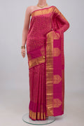 Pink Kanchipuram Silk Saree with Jacquard design on the body and Zari Border.  displayed on a mannequin