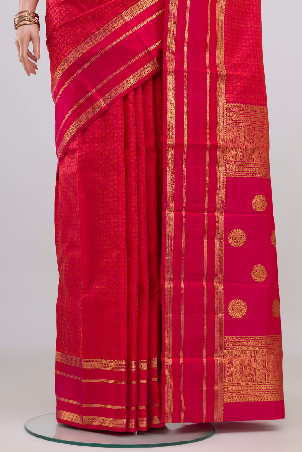 Pleats and pallu of Pink Kanjivaram Silk Saree with Jacquard design on the body and Zari Border. 