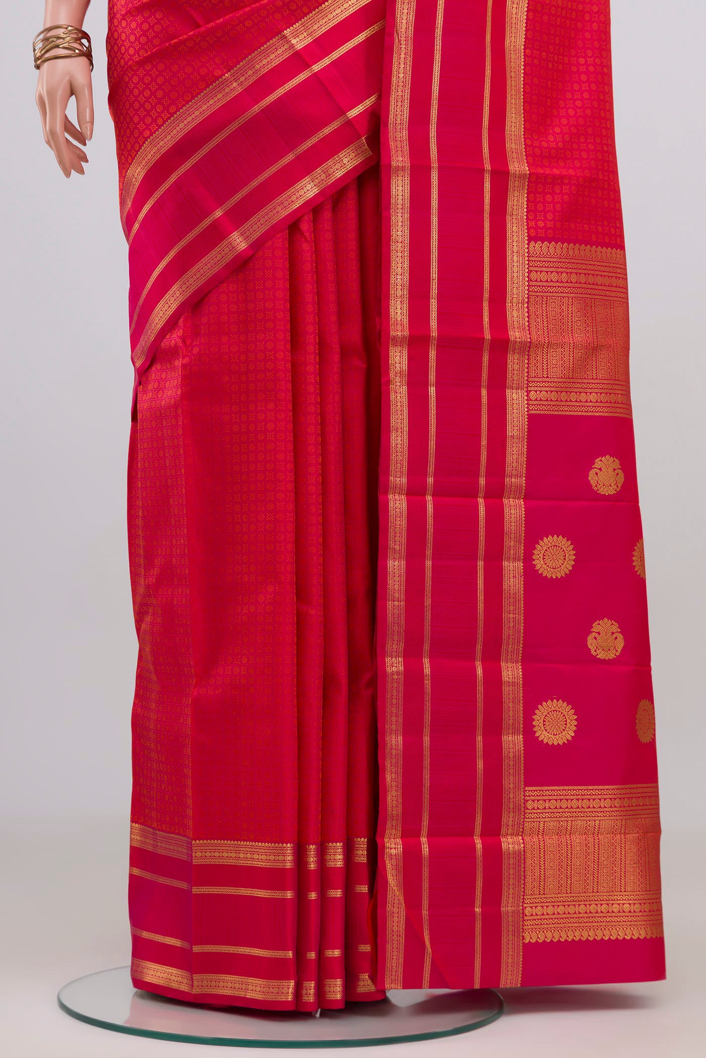 Pleats and pallu of Pink Kanjivaram Silk Saree with Jacquard design on the body and Zari Border. 