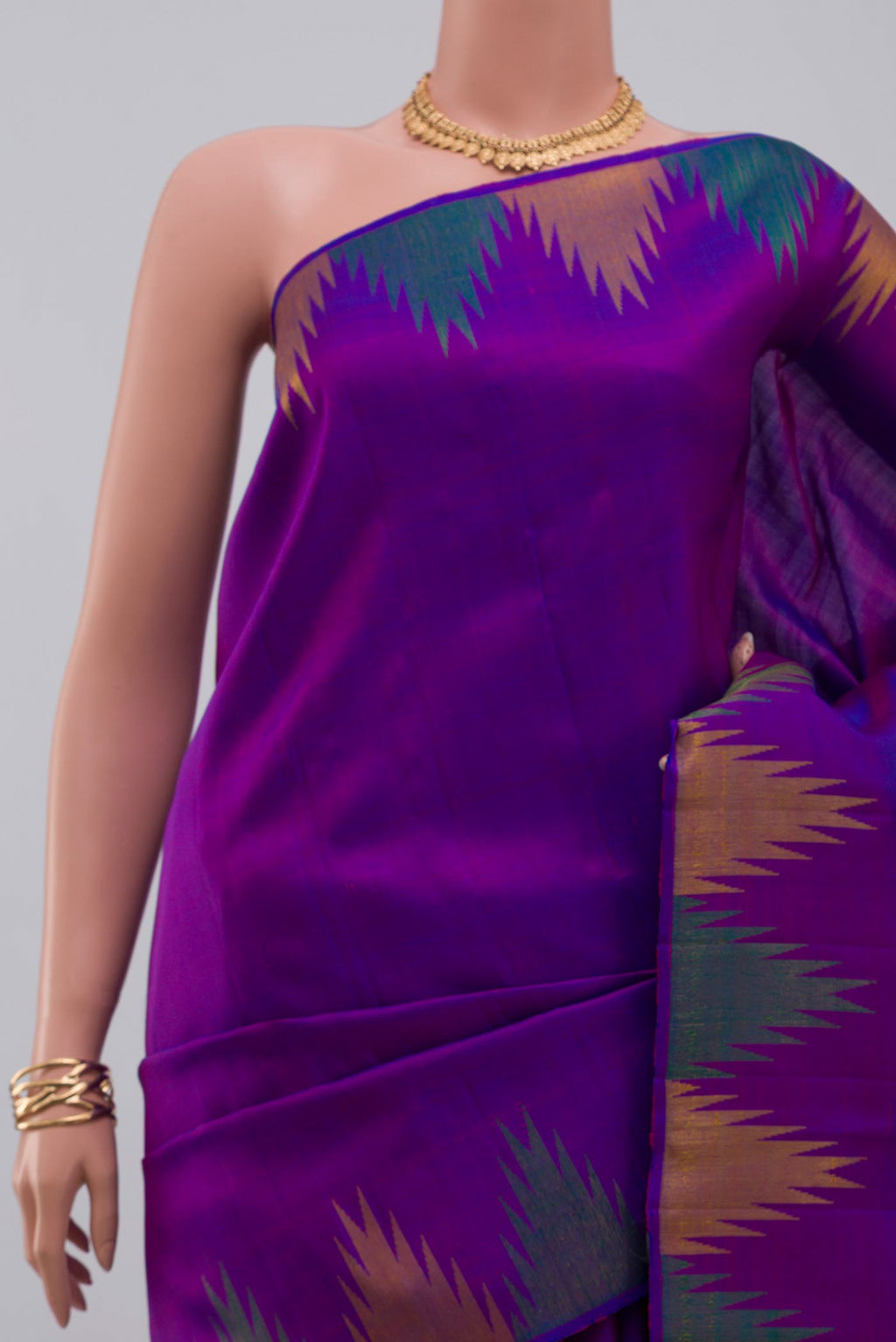 Border image of Purple Kanjivaram Saree with Plain Body and Temple Border. 
