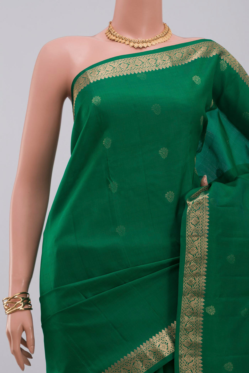 Border image of Green Kanjivaram Silk Saree with Zari Butta on the body and Zari Border. 