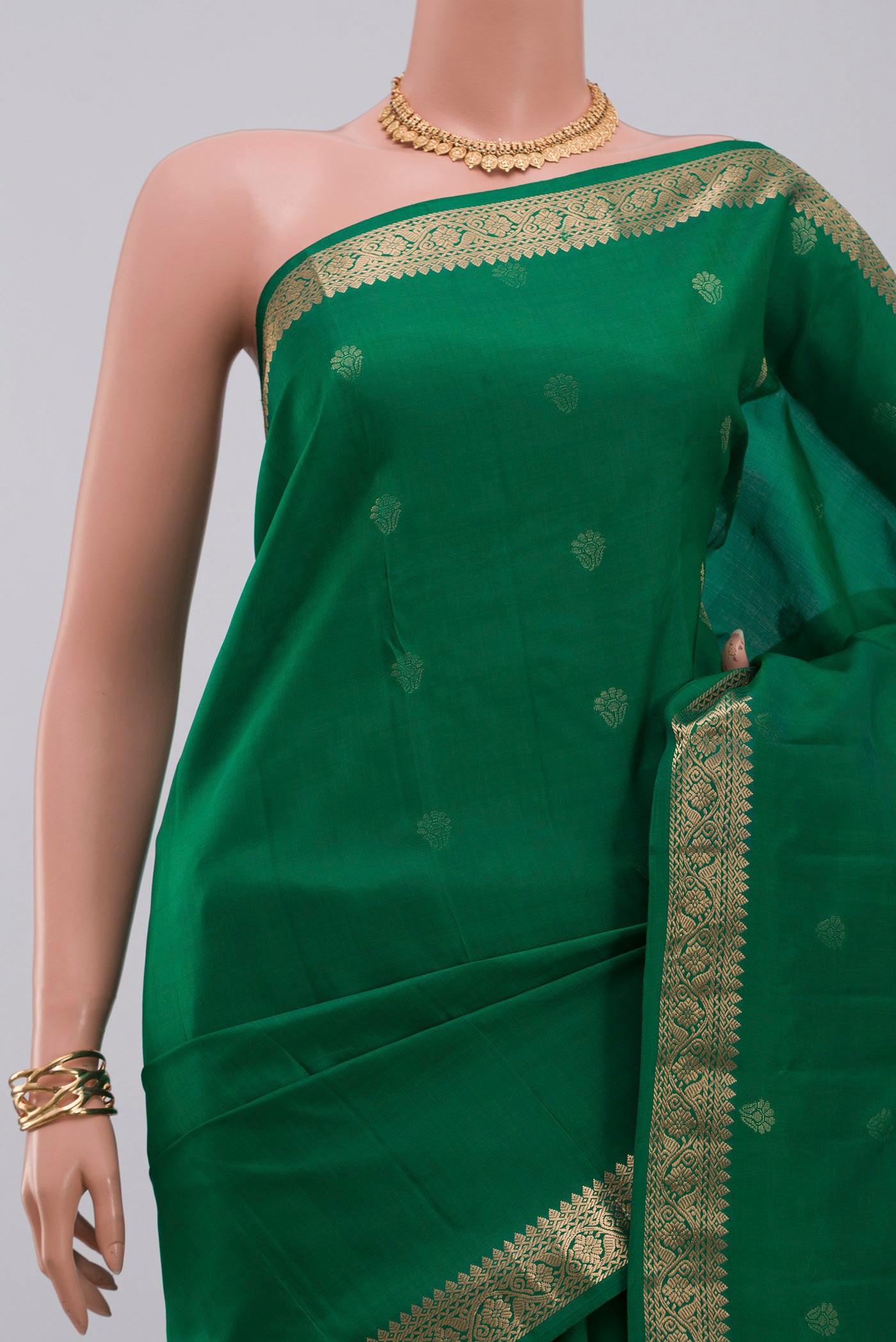 Border image of Green Kanjivaram Silk Saree with Zari Butta on the body and Zari Border. 