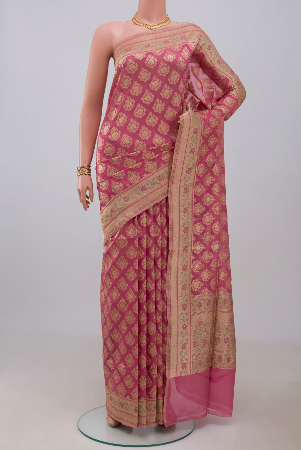 Pink Banarasi Silk Saree with Zari Butta on the body and Zari Border.  displayed on a mannequin