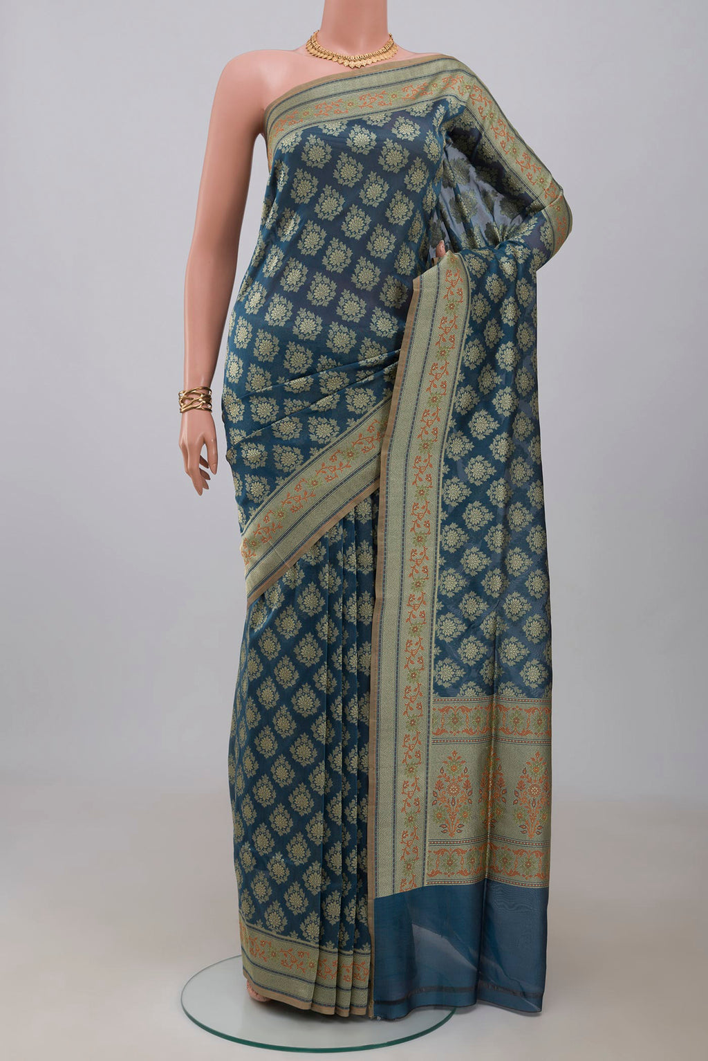 Blue Banarasi Saree with Fancy on the body and Fancy Border.  displayed on a mannequin