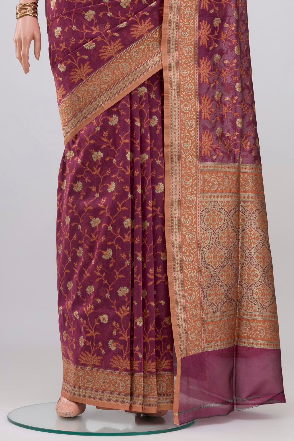 Pleats and pallu of Mauve Banarasi Silk Saree with Zari And Thread Butta on the body and Zari Border. 