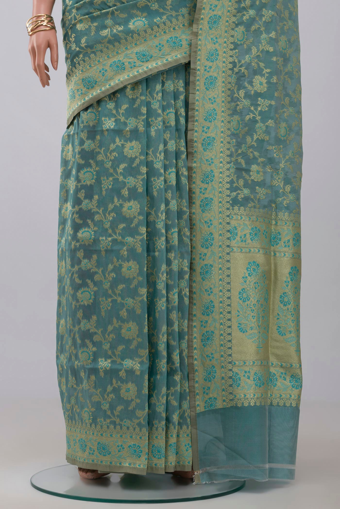 Pleats and pallu of Light Blue Banarasi Saree with Fancy on the body and Fancy Border. 