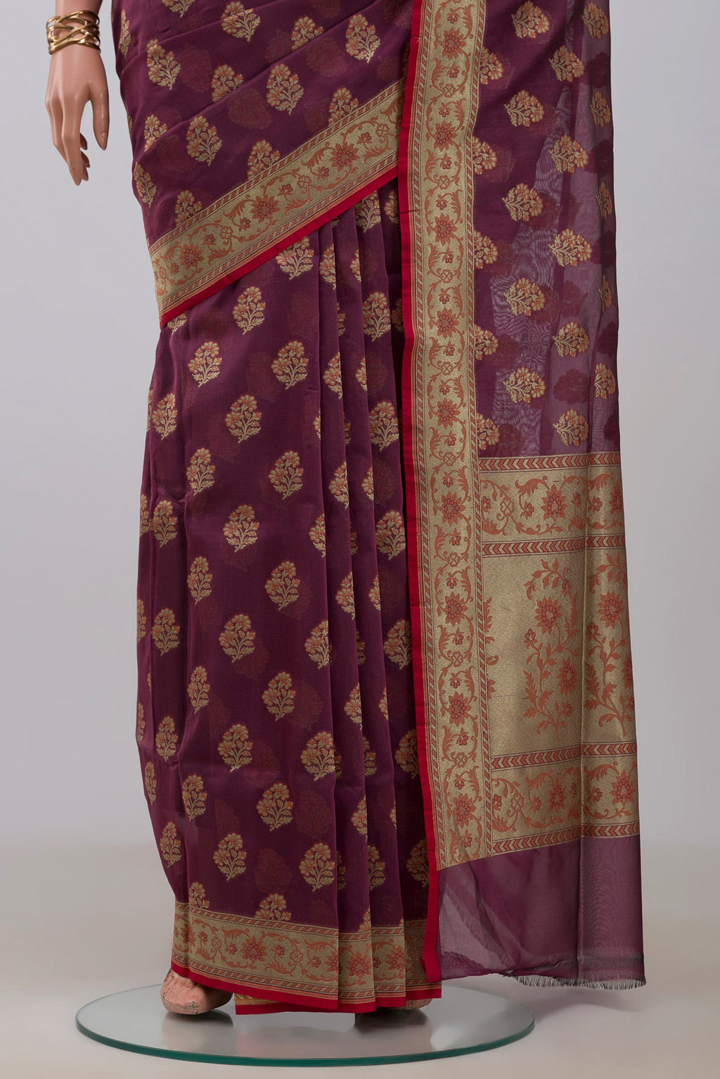Pleats and pallu of Purple Banarasi Saree with Zari Butta on the body and Fancy Border. 