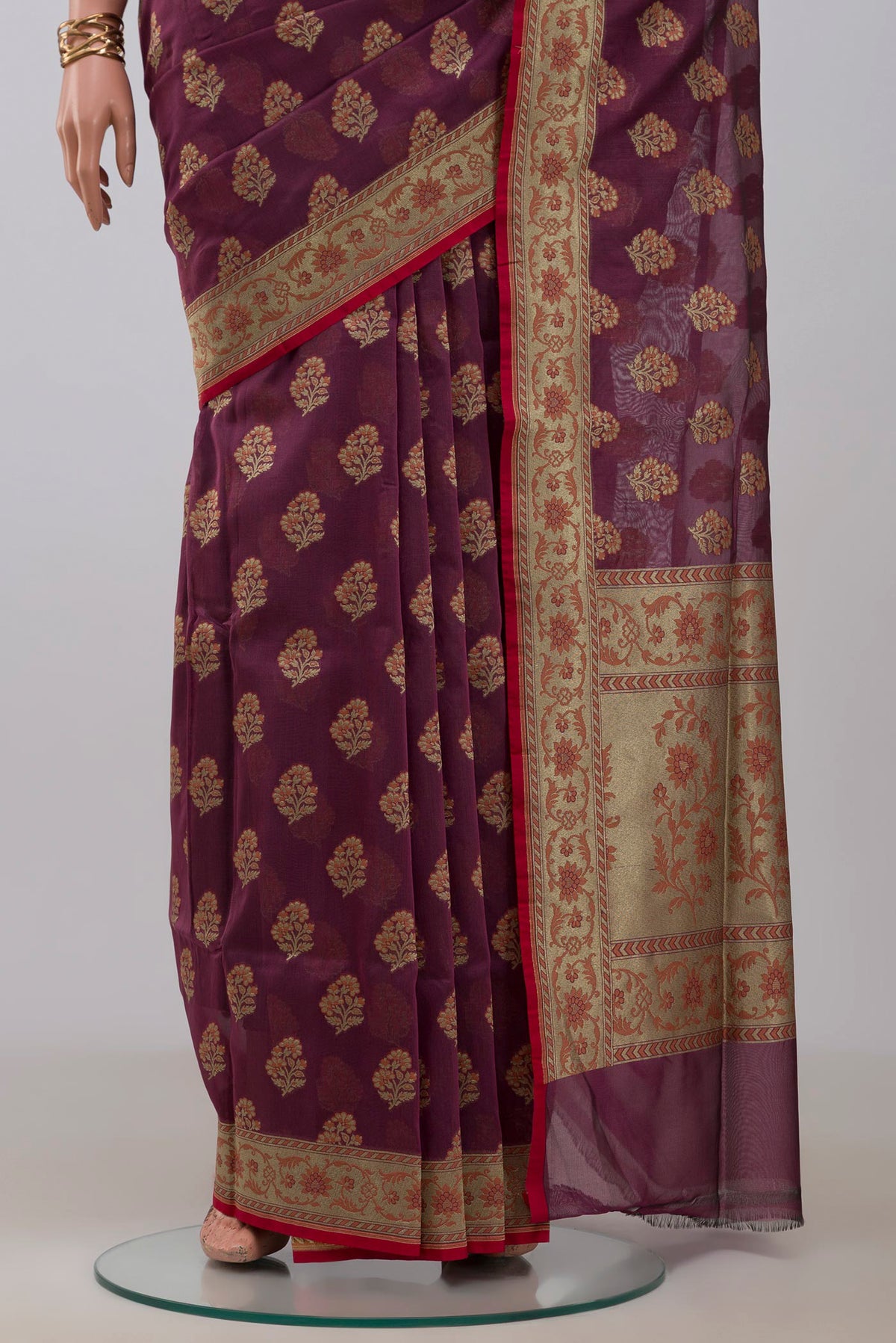 Pleats and pallu of Purple Banarasi Saree with Zari Butta on the body and Fancy Border. 
