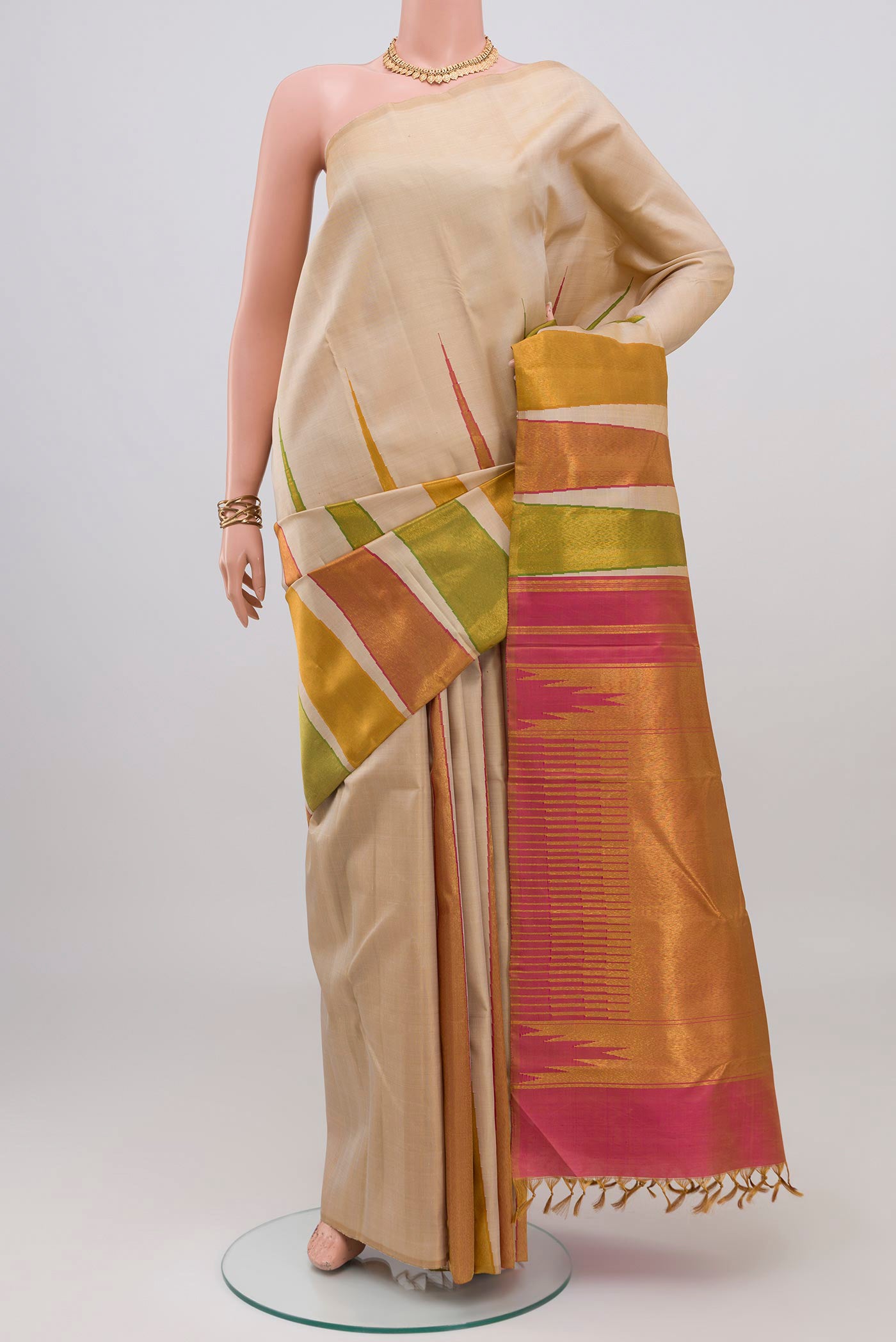 Cream Kanjivaram Silk Saree with Plain Body and Temple Border.  displayed on a mannequin